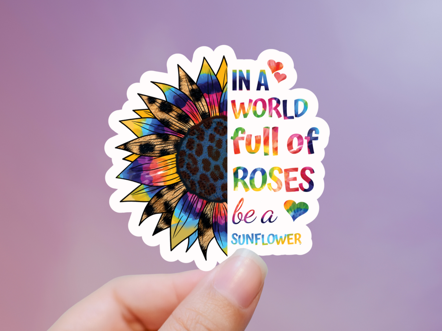 In A World Of Roses Be A Sunflower Sticker