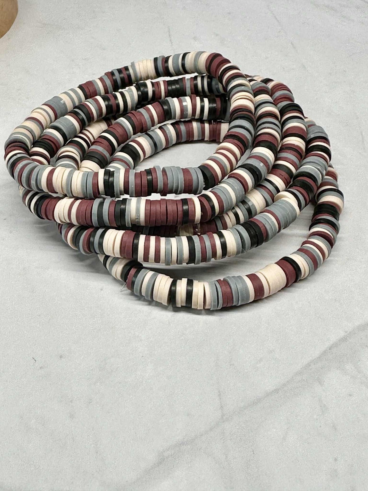 Single Strand Ivory Eclipse Clay Stretch Bracelet