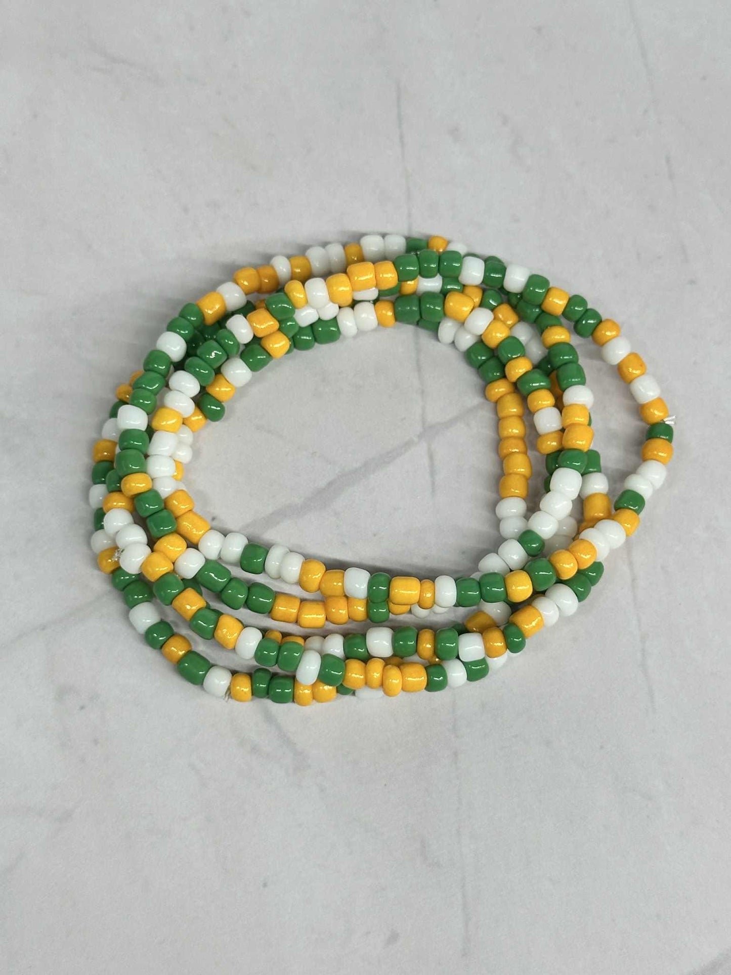Single Strand Green, White, and Yellow Seed Bead Stretch Bracelet