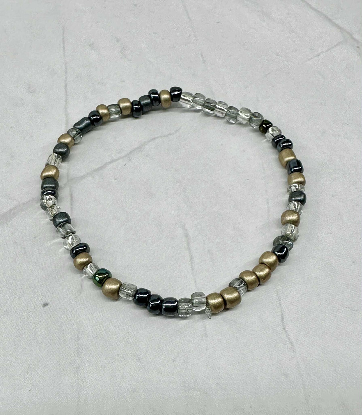 Single Strand Multi Black/Silver/Gold Seed Bead Stretch Bracelet