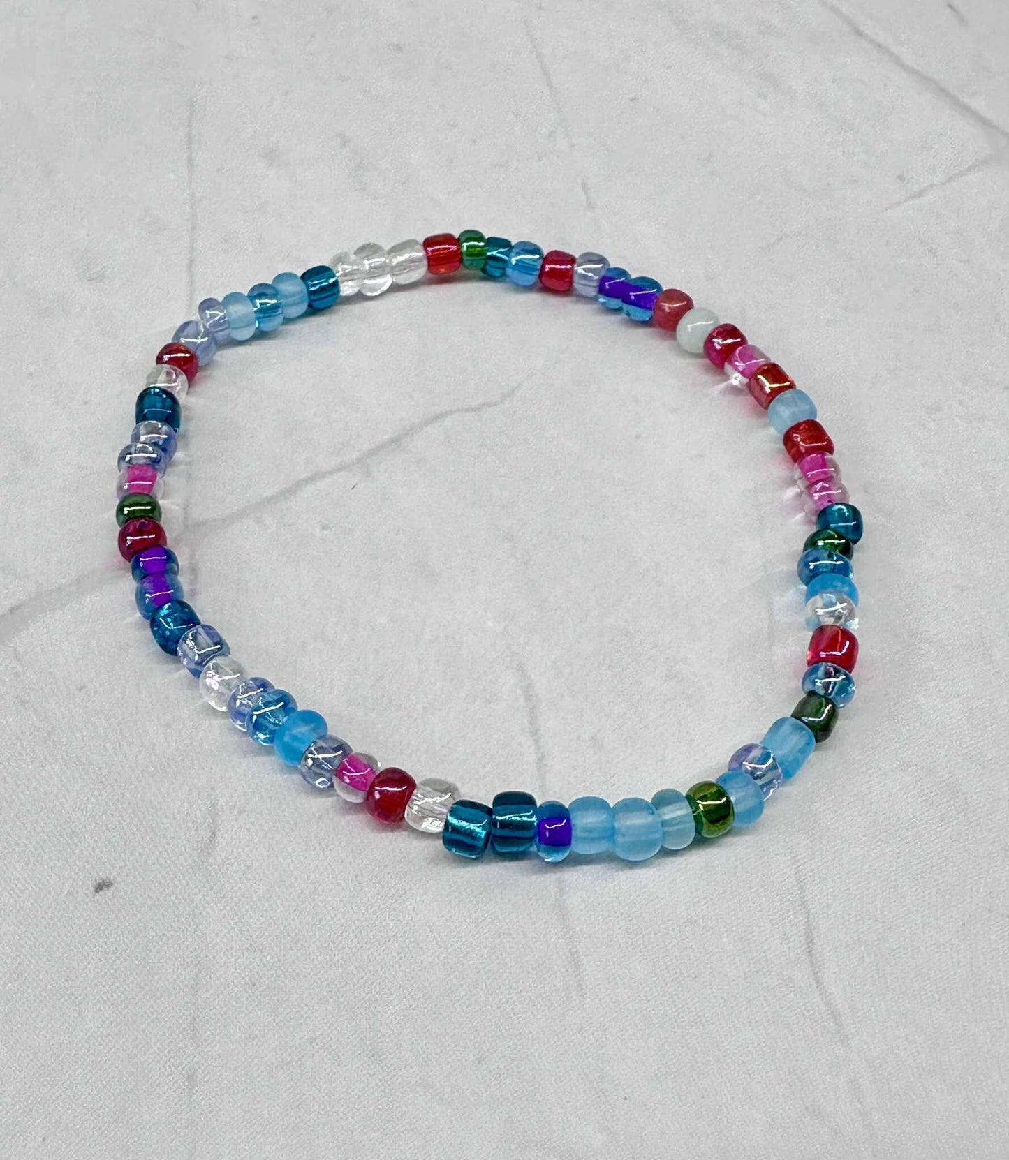 Single Strand Multi Turquoise/Berry Seed Bead Stretch Bracelet