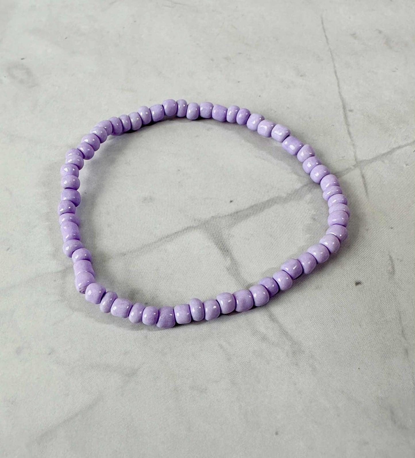 Single Strand Purple, Pink, White Seed Bead Stretch Bracelet
