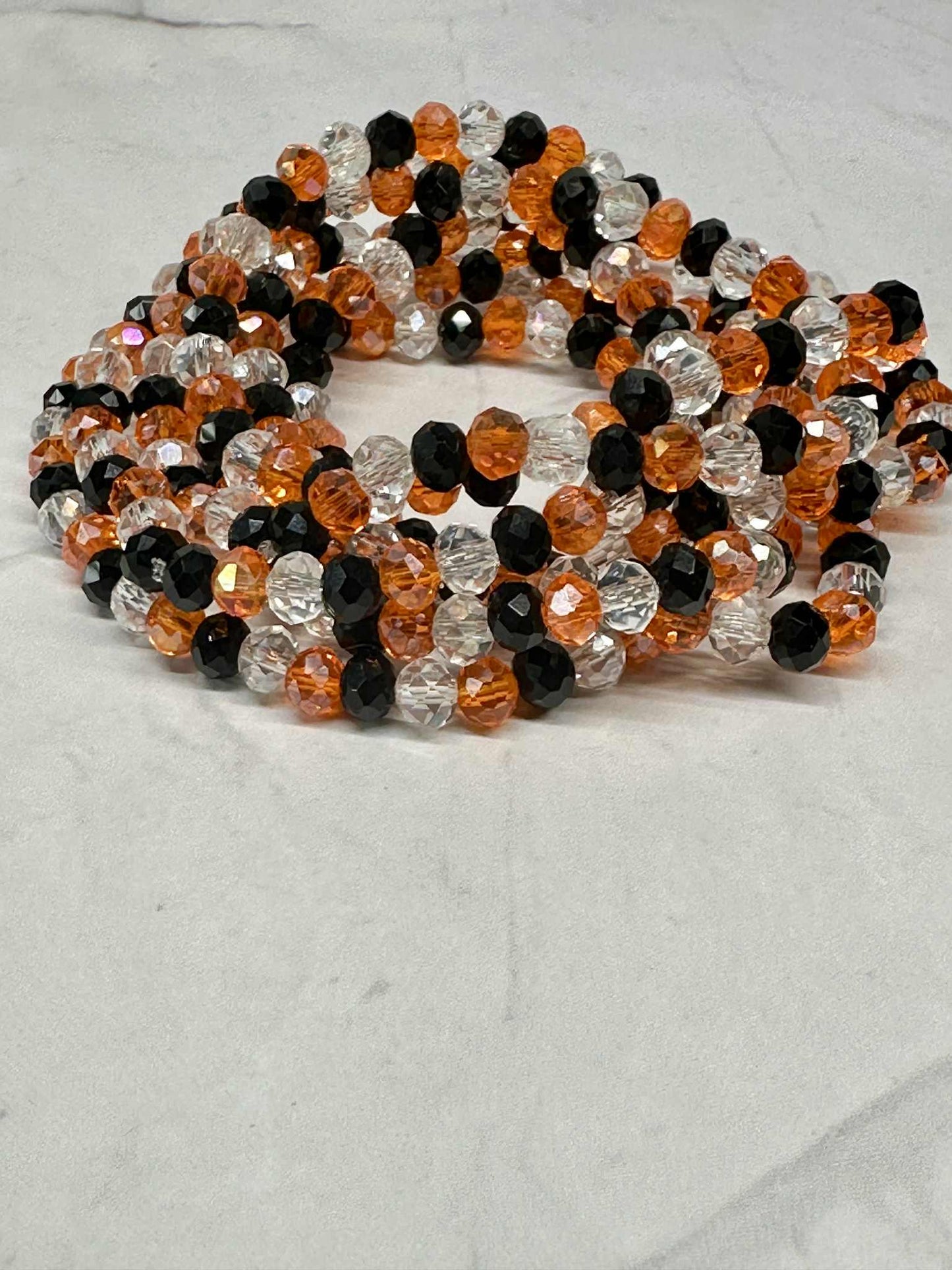 Single Strand Halloween Stretch Bracelet: Clear, Black & Orange Faceted Beads