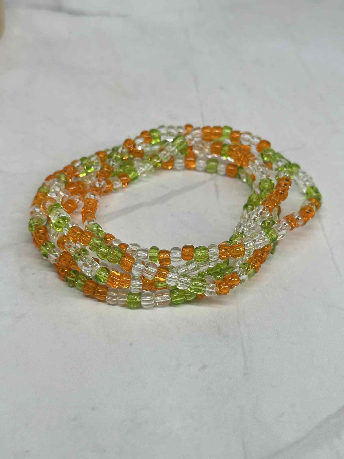 Single Strand Green, Orange, Translucent Glass Seed Bead Bracelet