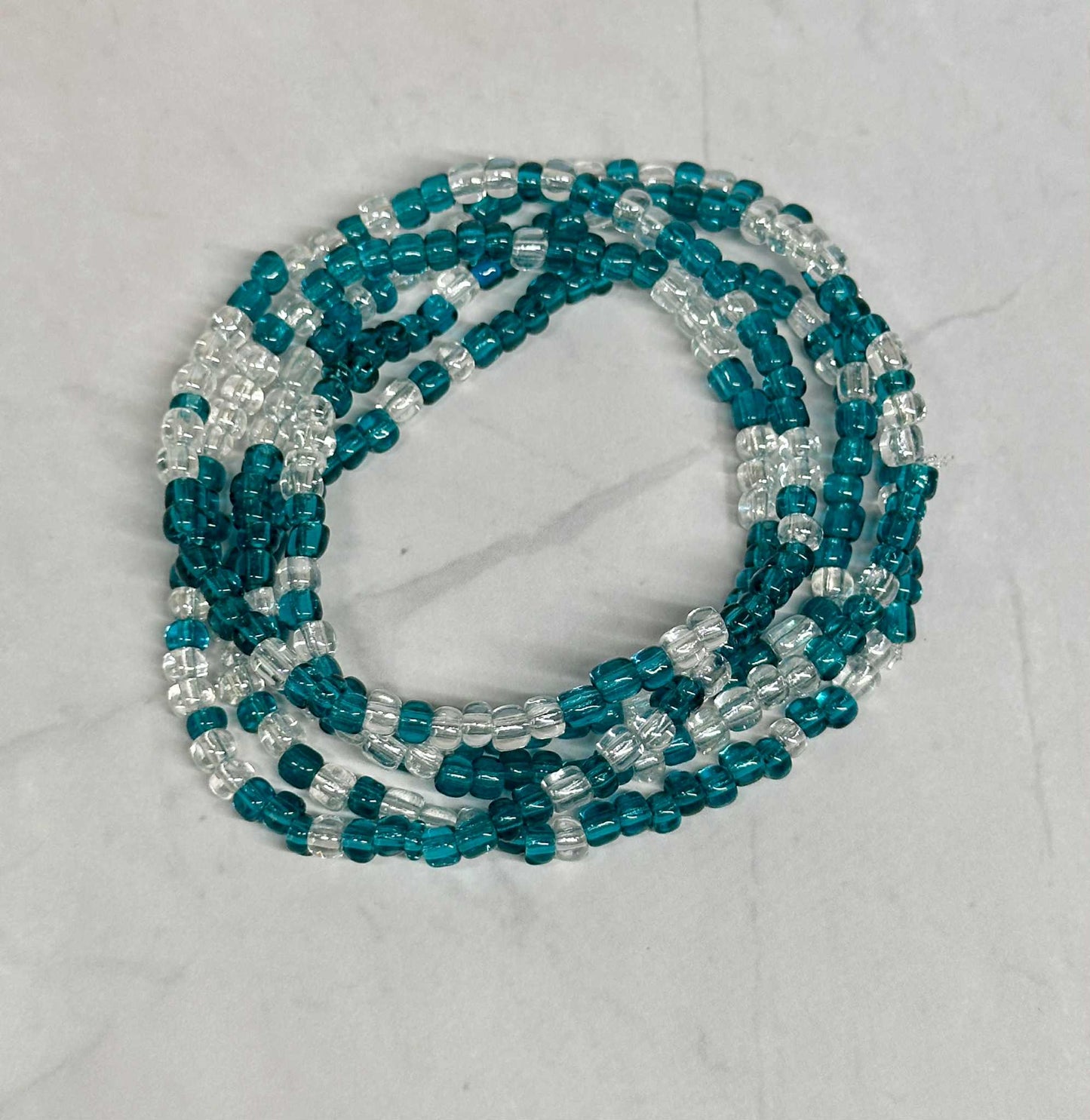 Single Strand Translucent Turquoise/Clear Seed Bead Bracelet