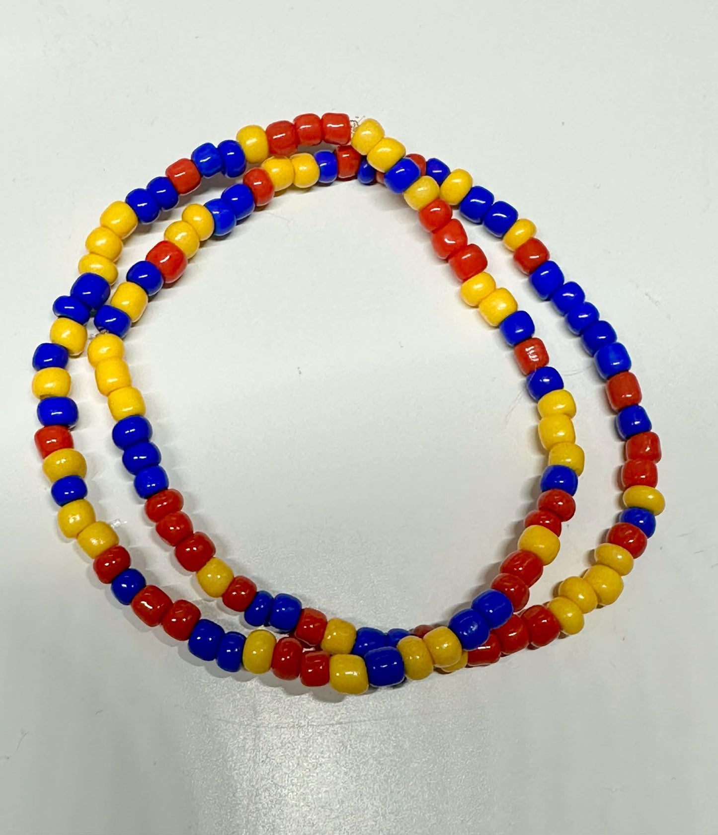 Single Strand Red, Blue, and Yellow Seed Bead Bracelet