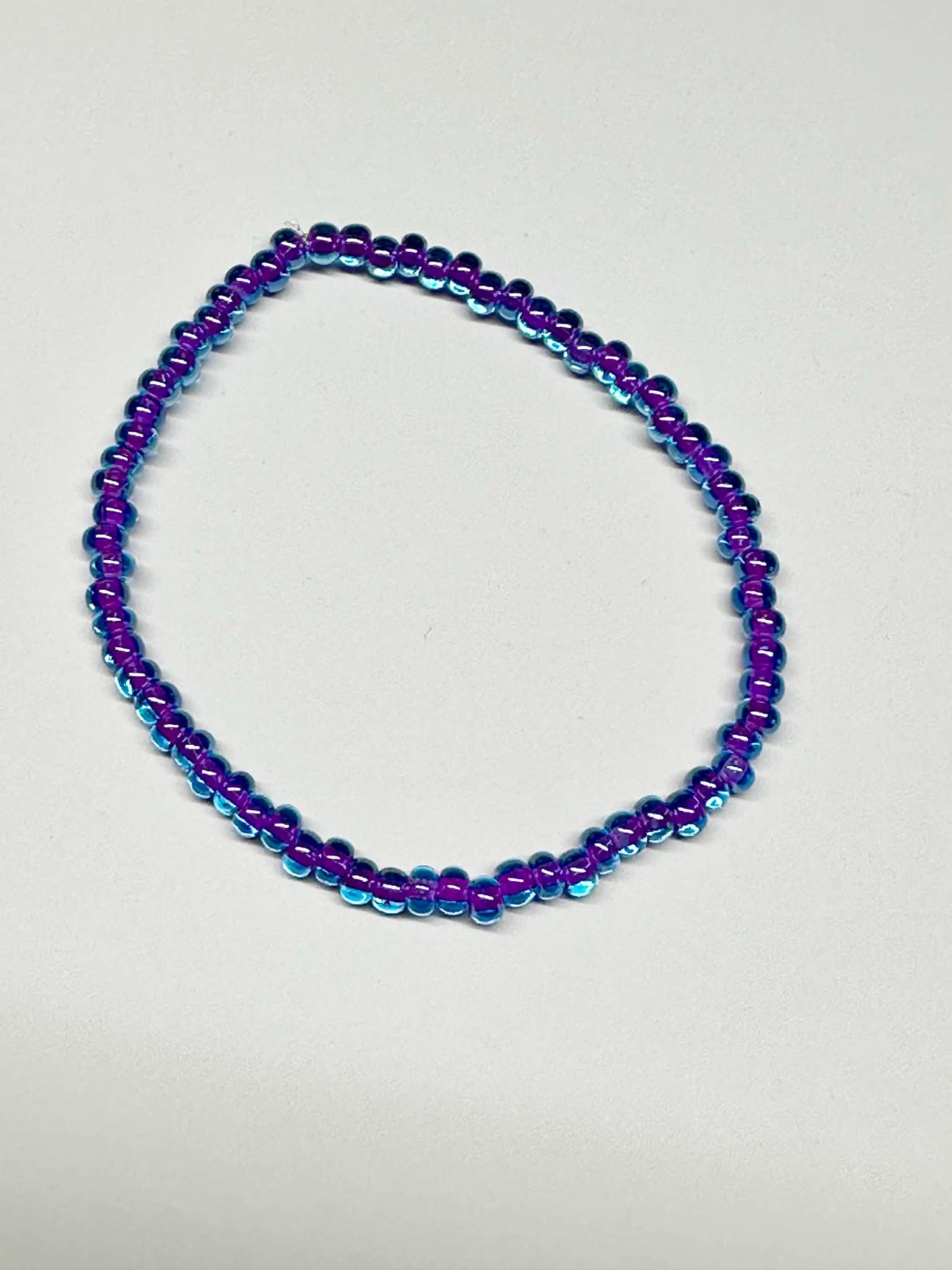 Single Strand Purple & Blue Transparent Seed Bead Bracelet