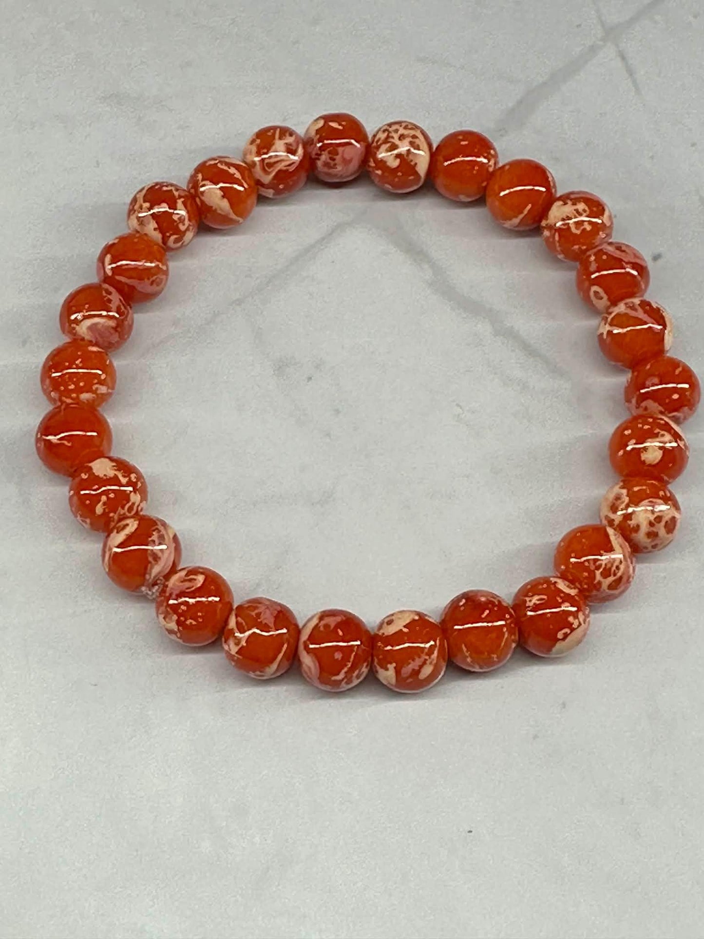 Single Strand Orange Marble Beaded Stretch Bracelet