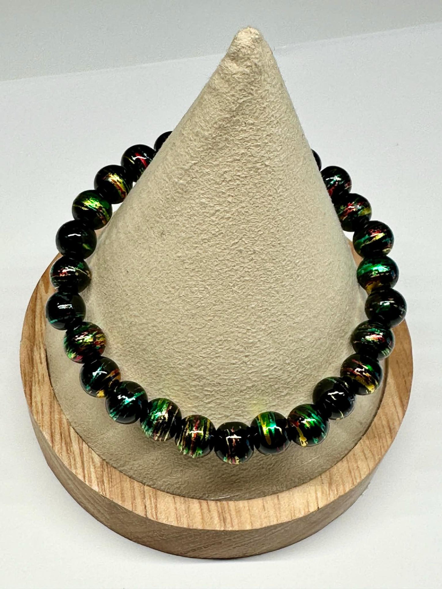 Single Strand Black, Green, Red, Gold Mixture Beaded Stretch Bracelet