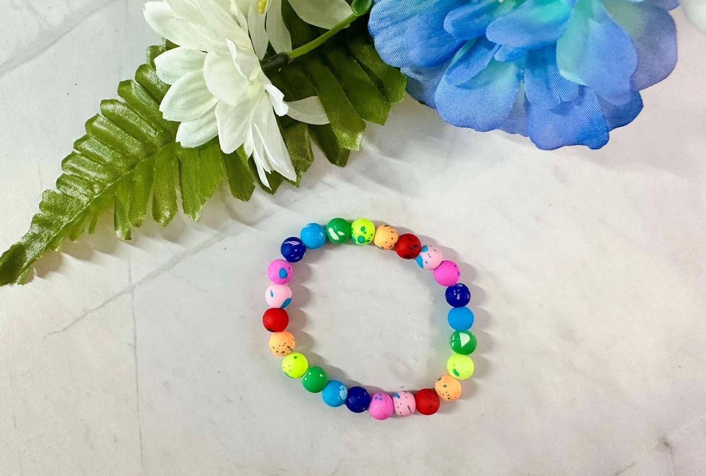 Single Strand Rainbow Splatter Rubber Bead Stretch Bracelet