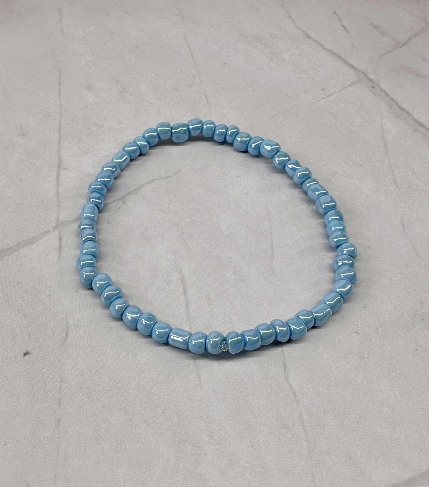 Single Strand Blue Luster Seed Bead Stretch Bracelet