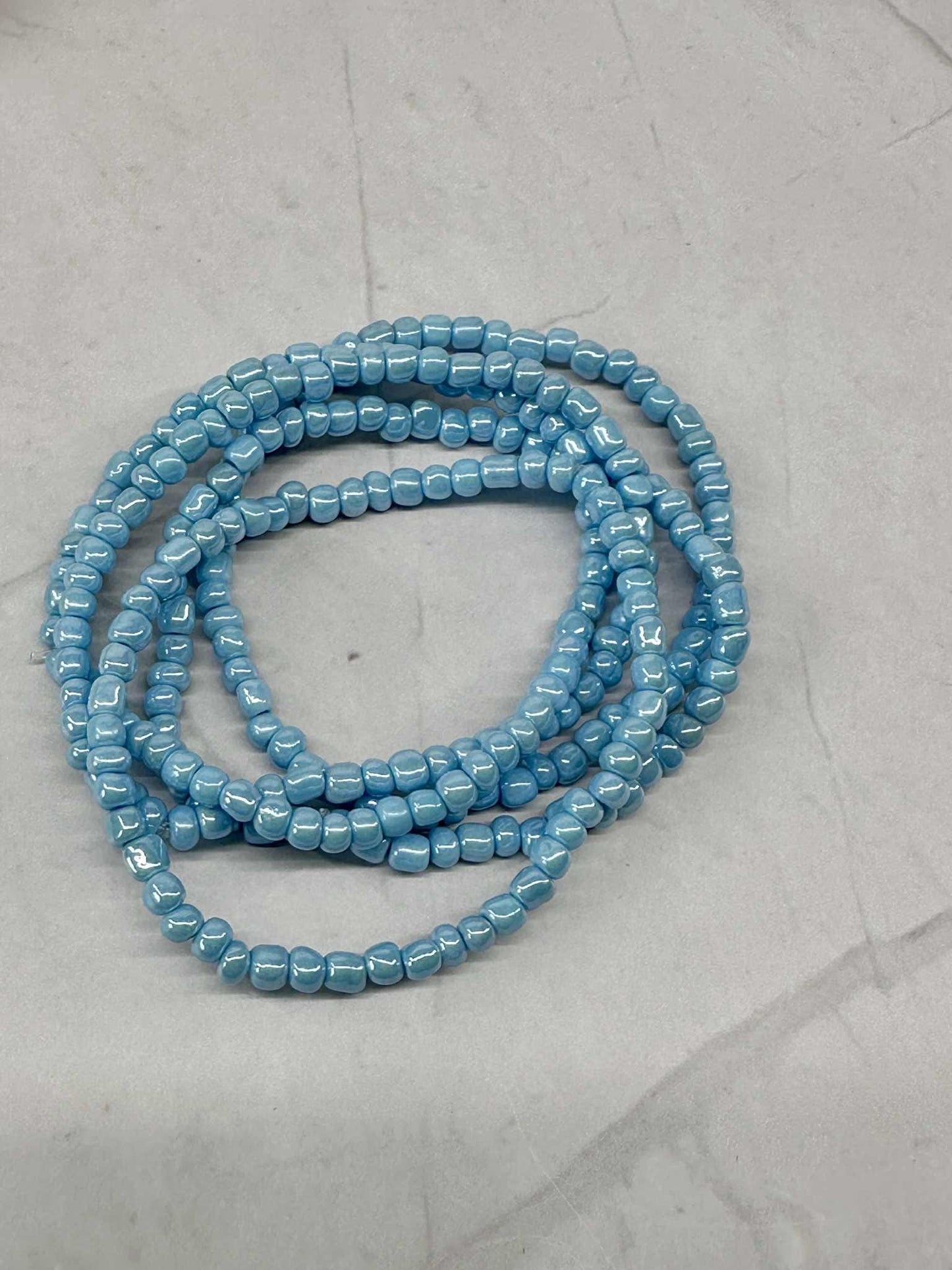 Single Strand Blue Luster Seed Bead Stretch Bracelet