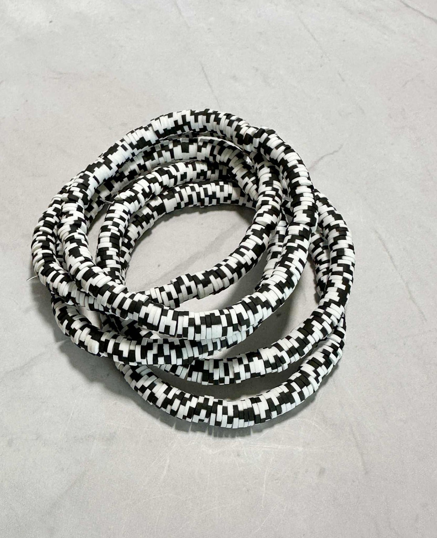 Single Strand Raven Snow Heishi Clay Bead Bracelet