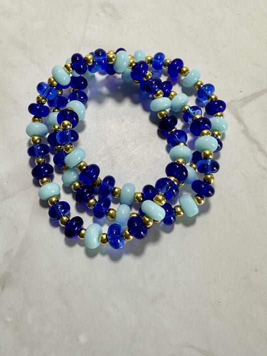 Single Strand Blue Ocean Glass Beaded Stretch Bracelet: Gold Accents