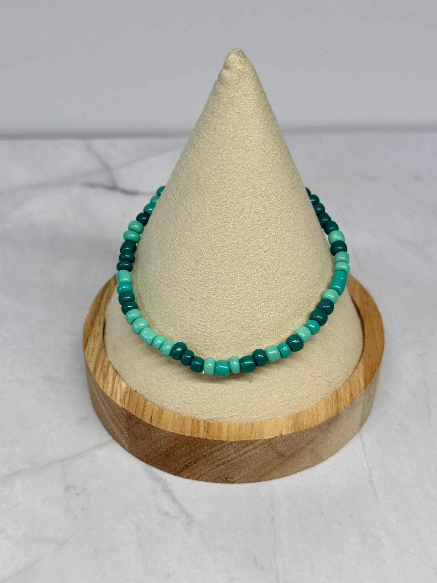 Single Strand Multi Green/Teal Seed Bead Stretch Bracelet