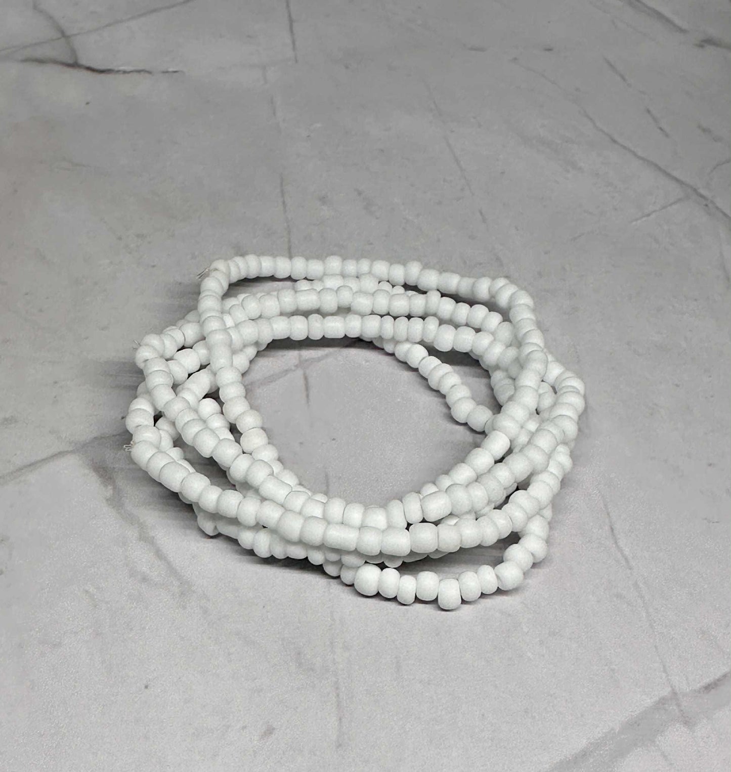 Single Strand White Luster Seed Bead Stretch Bracelet
