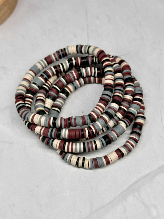 Single Strand Ivory Eclipse Clay Stretch Bracelet