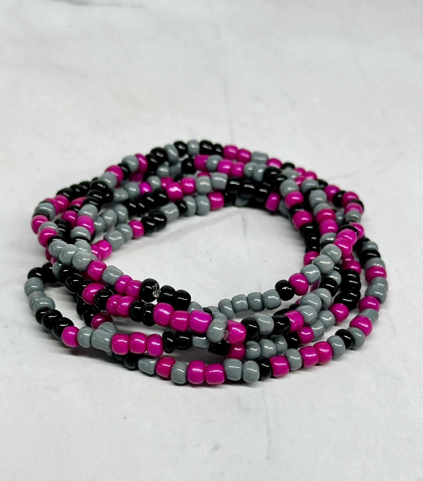 Single Strand Magenta, Black, and Gray Seed Bead Stretch Bracelet