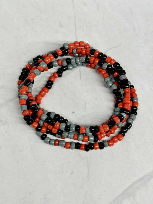 Single Strand Red, Black, and Gray Seed Bead Stretch Bracelet