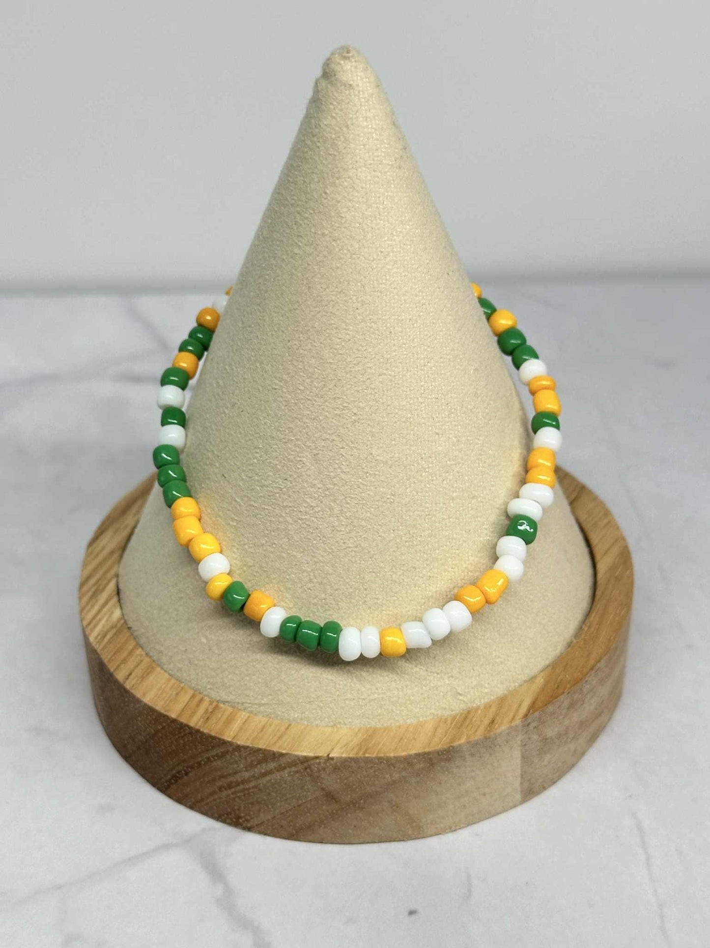 Single Strand Green, White, and Yellow Seed Bead Stretch Bracelet