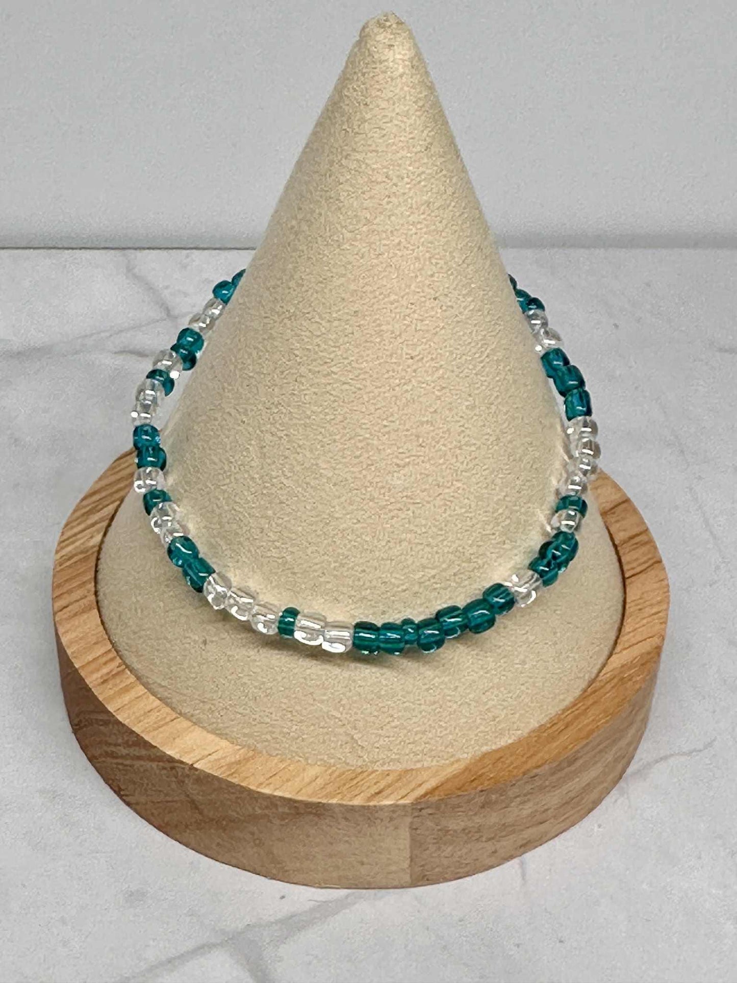 Single Strand Translucent Turquoise/Clear Seed Bead Bracelet