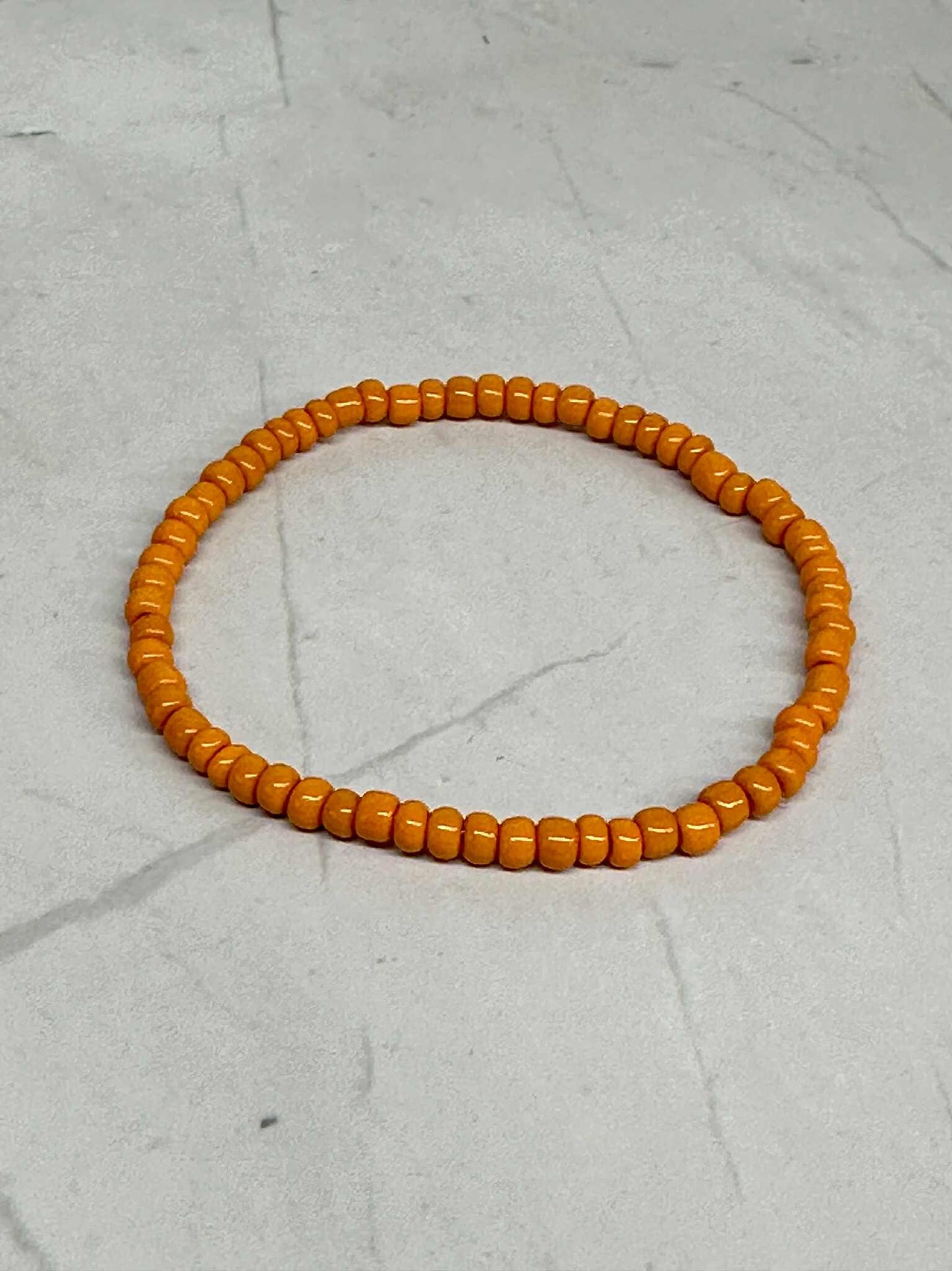 Single Strand Orange Seed Bead Bracelets