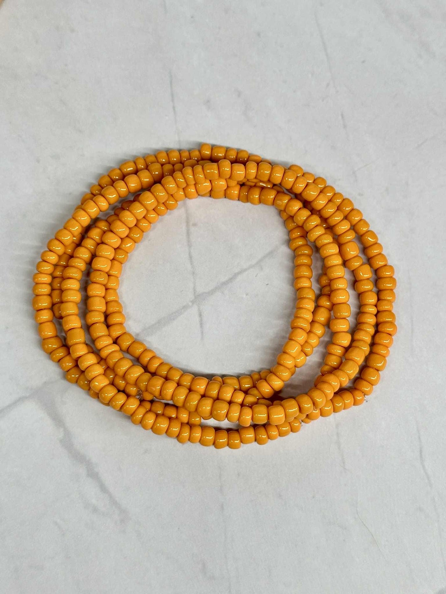 Single Strand Orange Seed Bead Bracelets