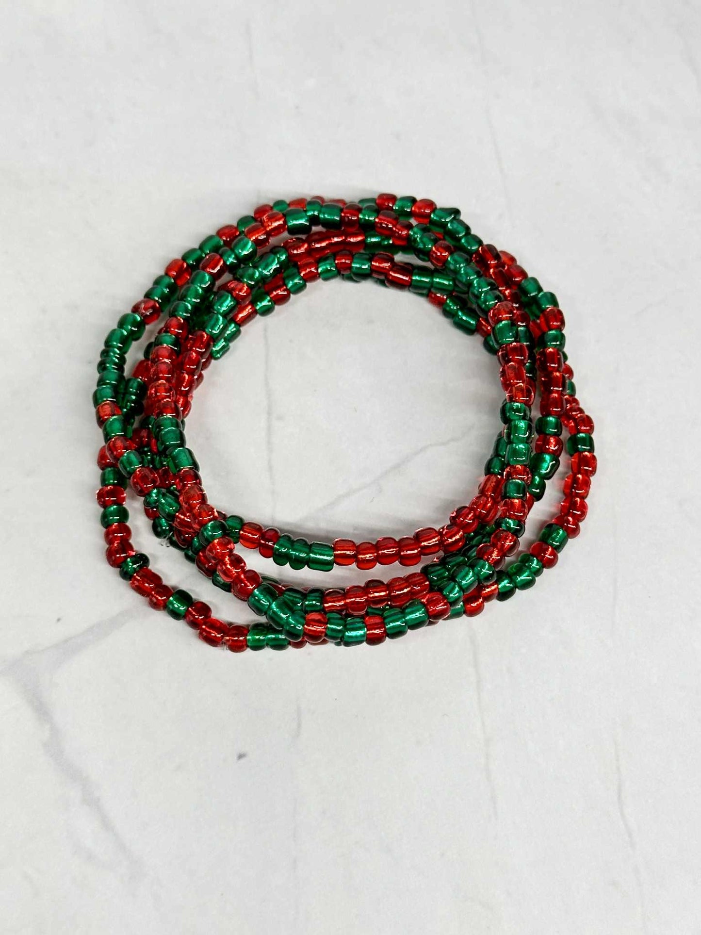 Single Strand Red and Green Translucent Seed Bead Stretch Bracelet