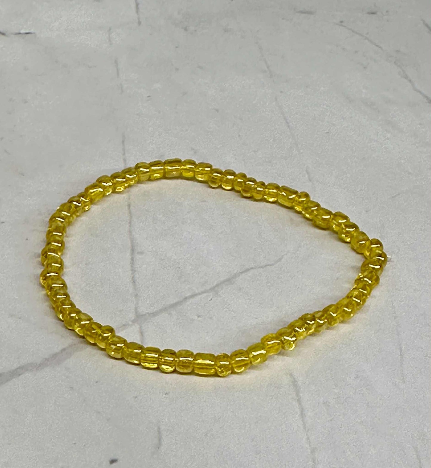 Single Strand Yellow Translucent Seed Bead Stretch Bracelet