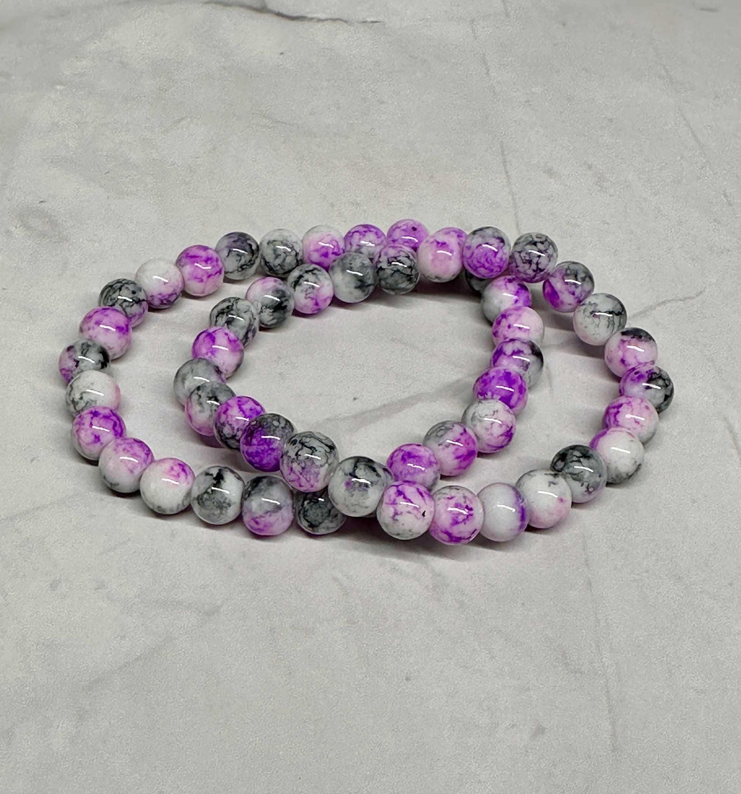 Purple, Black, and White Glass Beaded Stretch Bracelet