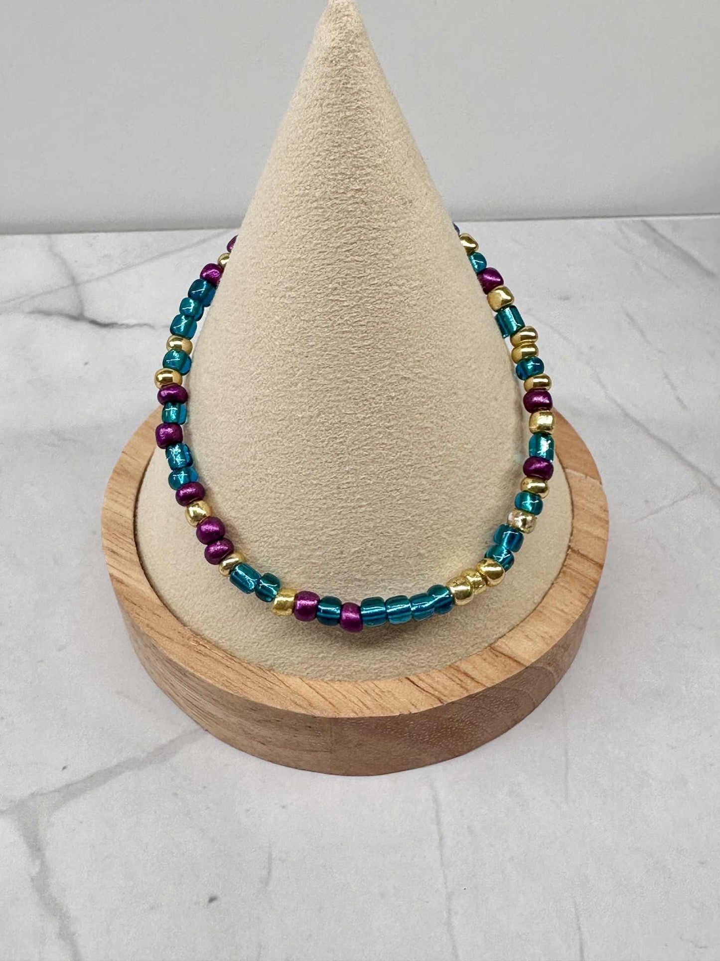 Single Strand Metallic Mardi Gras Seed Bead Bracelet