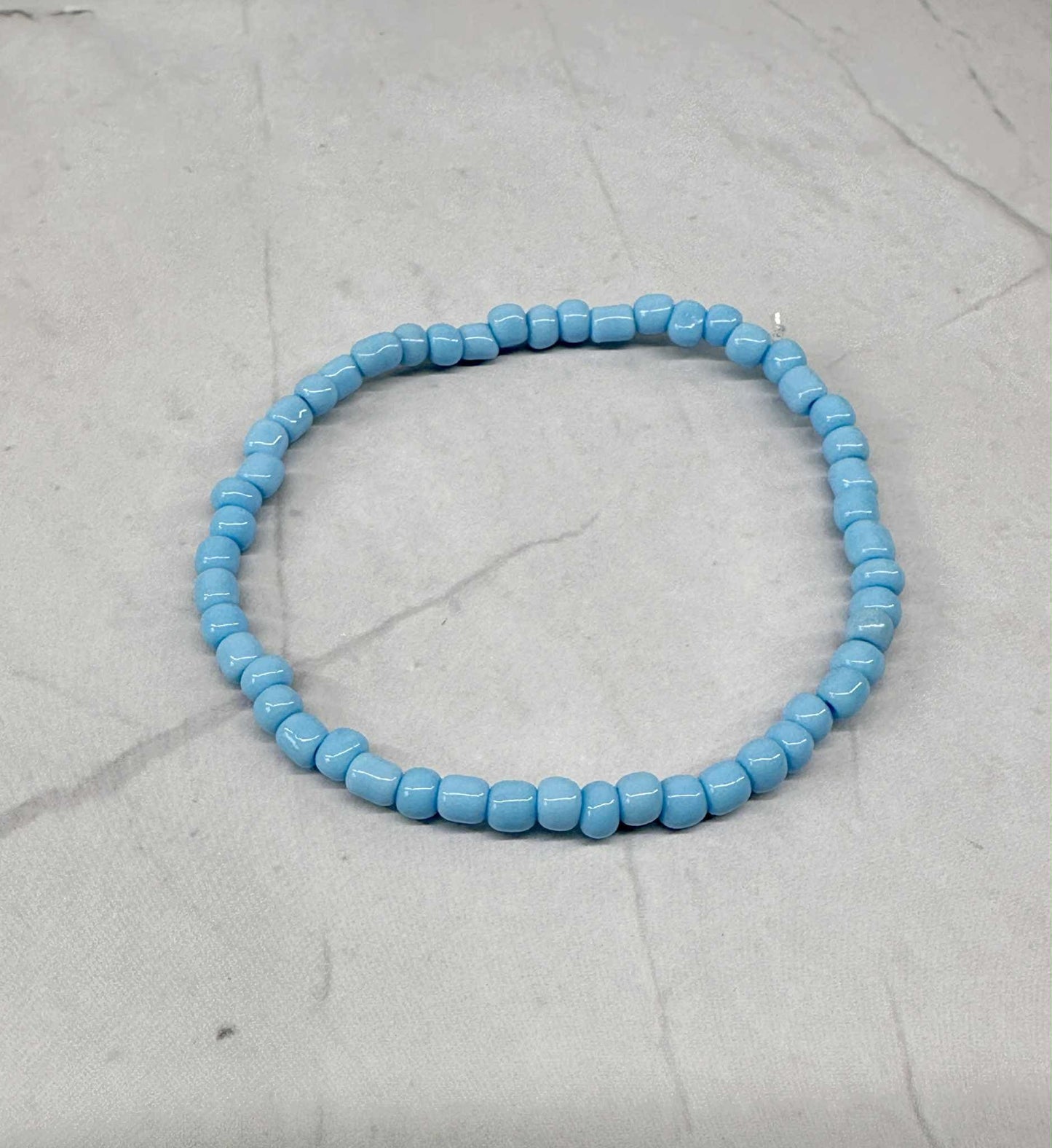 Single Strand Light Blue Seed Bead Stretch Bracelet