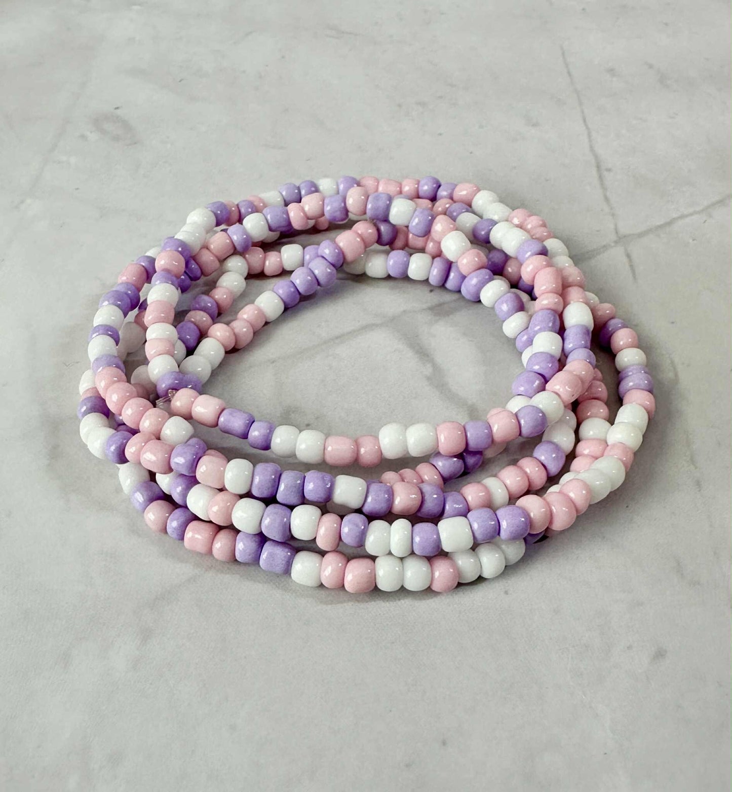 Single Strand Purple, Pink, White Seed Bead Stretch Bracelet