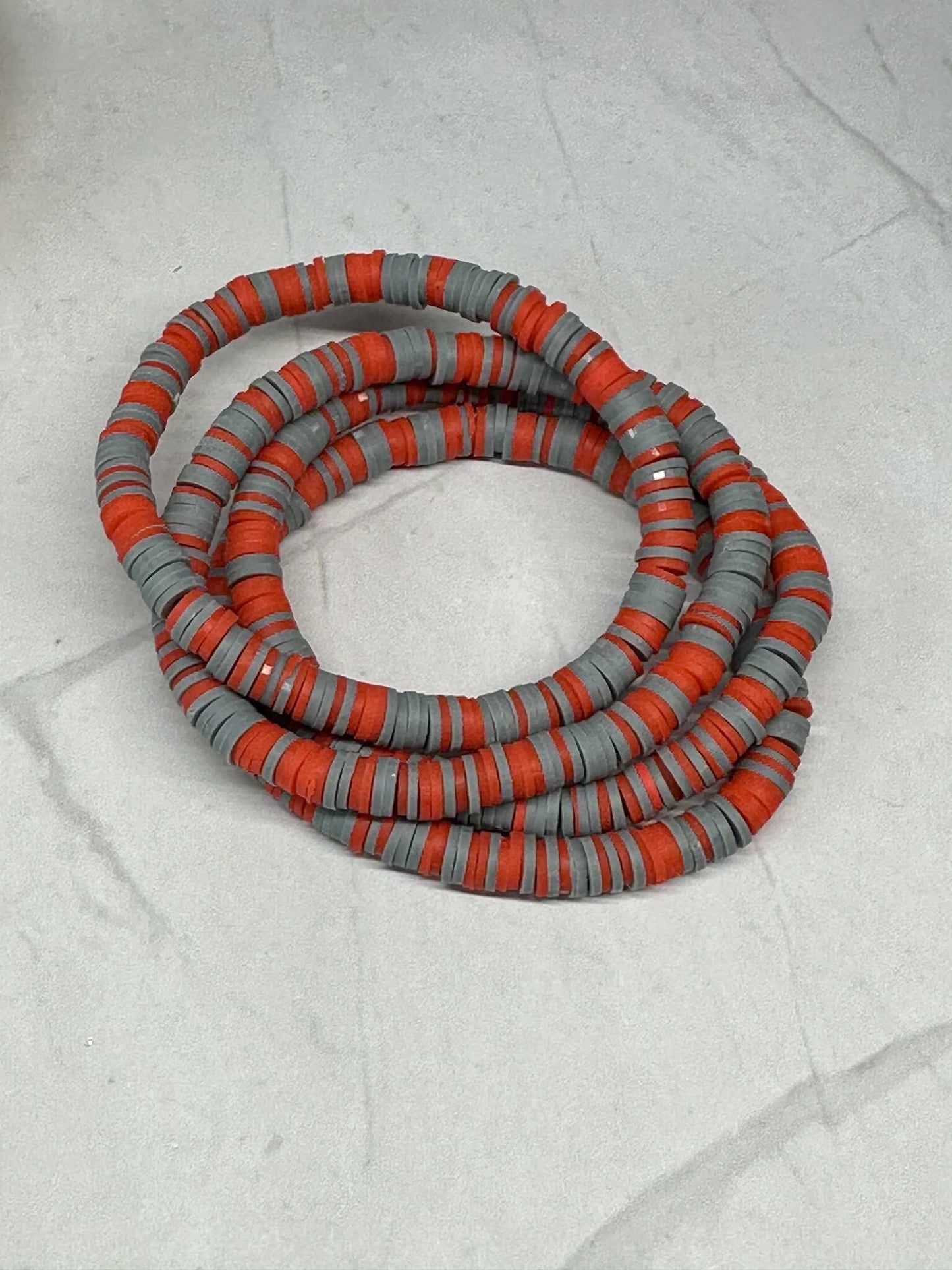 Single Strand Iron Flame Clay Stretch Bracelet