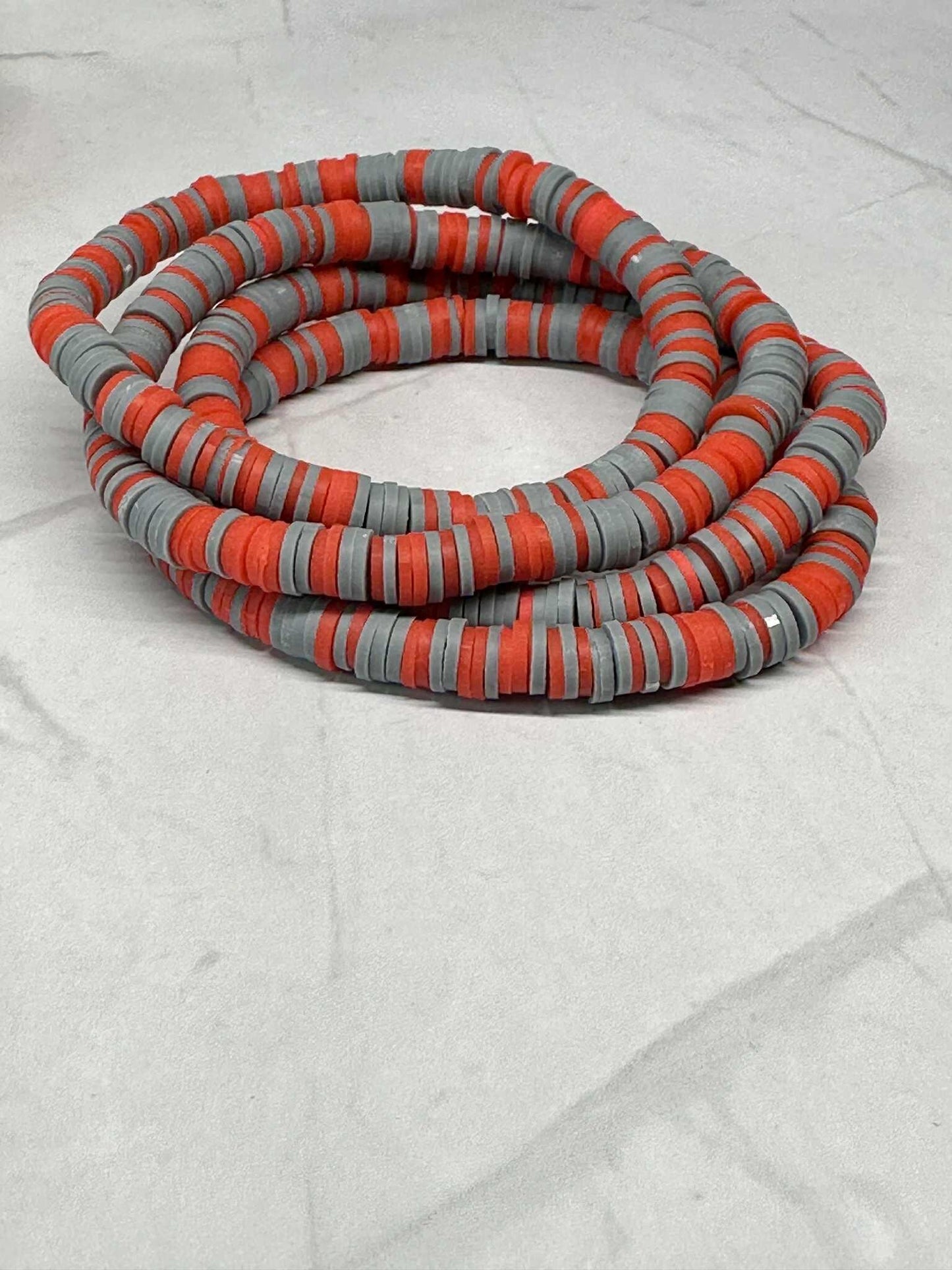 Single Strand Iron Flame Clay Stretch Bracelet