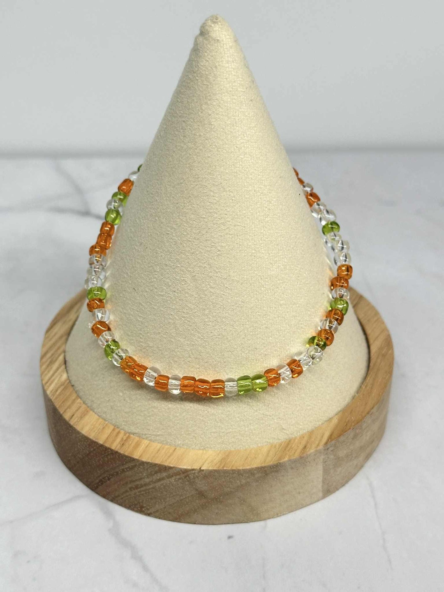 Single Strand Green, Orange, Translucent Glass Seed Bead Bracelet