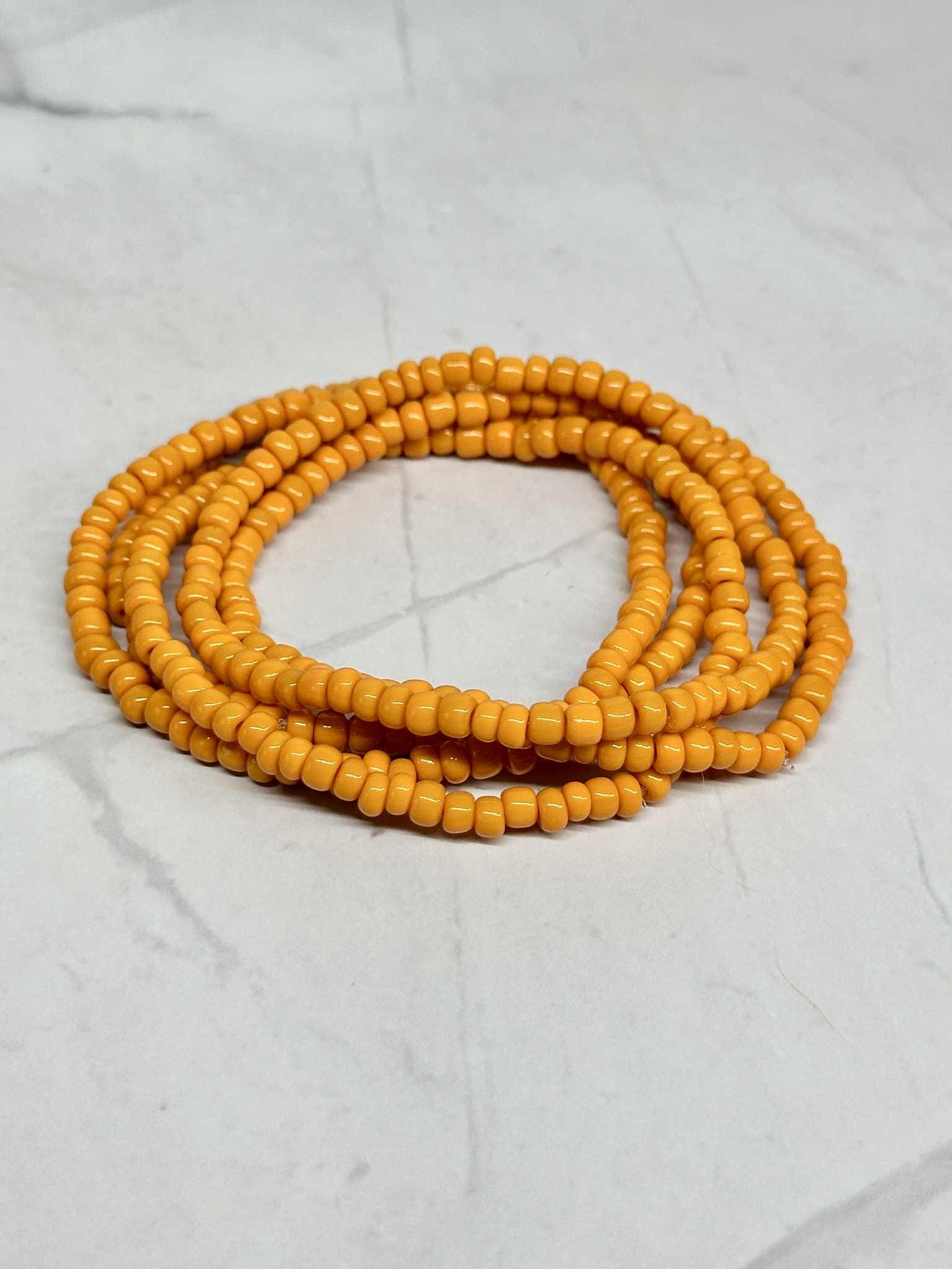 Single Strand Orange Seed Bead Bracelets