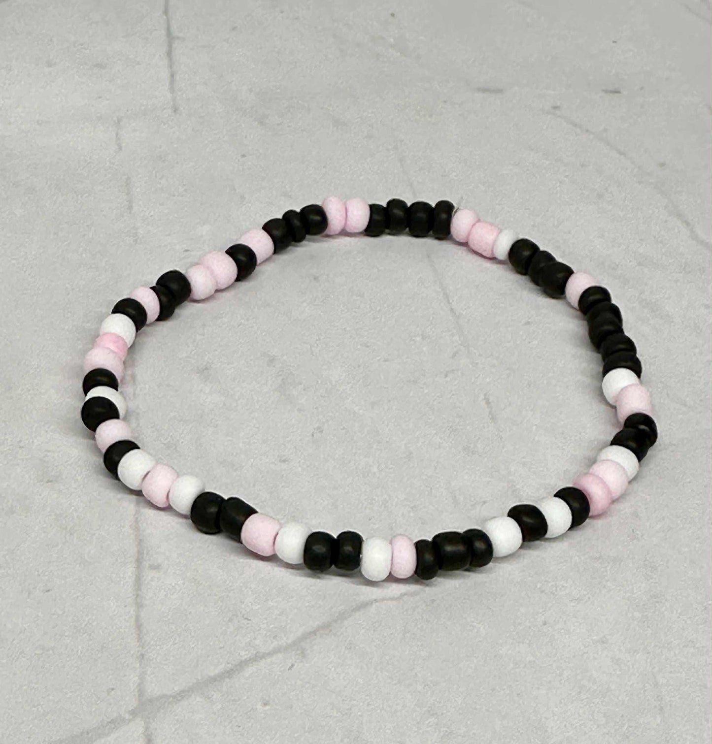 Single Strand Pink/Black/White Matte Seed Bead Bracelet