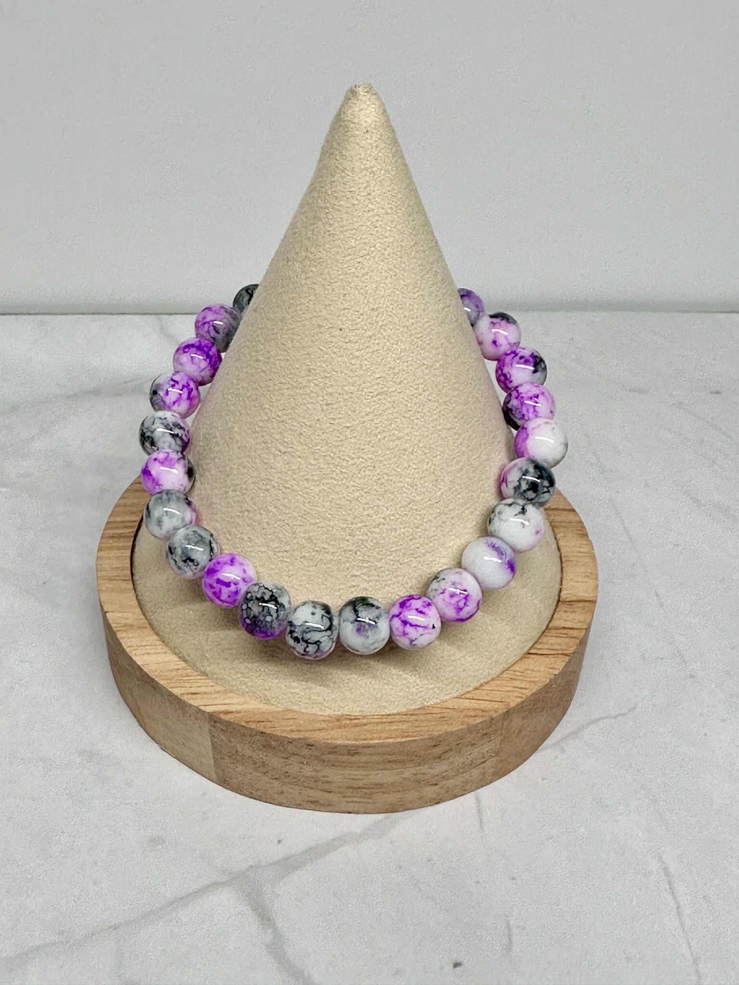 Purple, Black, and White Glass Beaded Stretch Bracelet