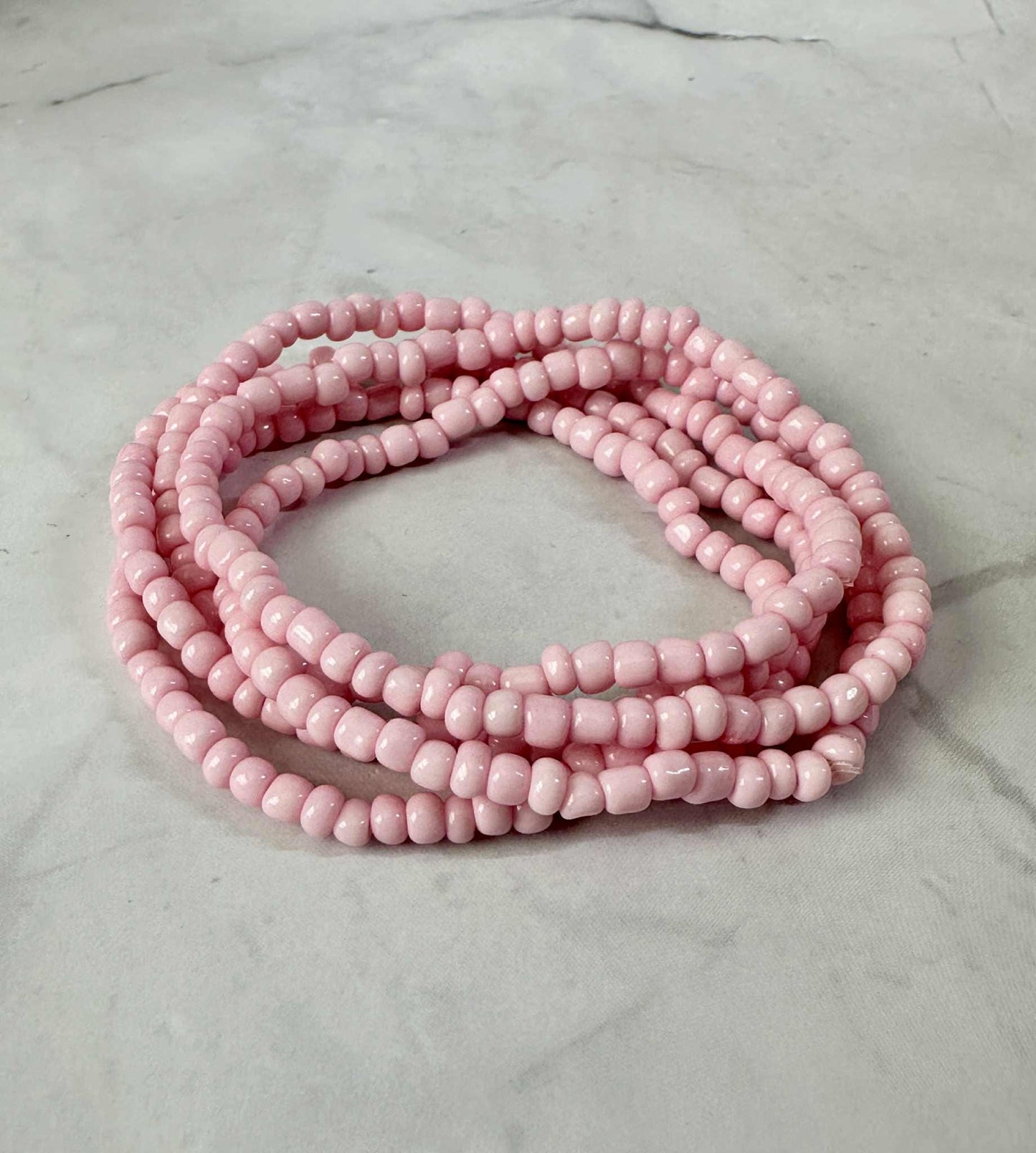 Single Strand Purple, Pink, White Seed Bead Stretch Bracelet