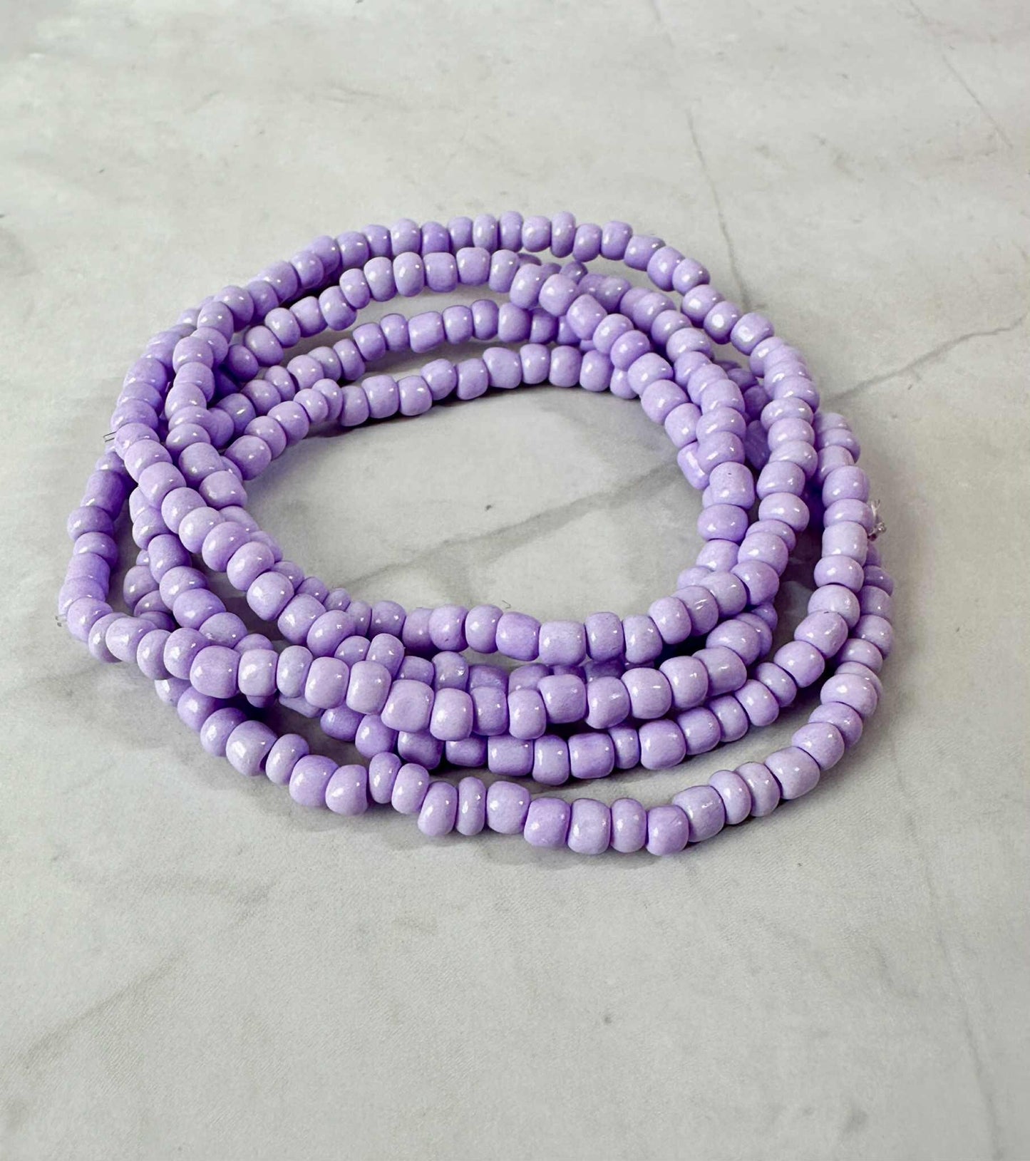 Single Strand Purple, Pink, White Seed Bead Stretch Bracelet