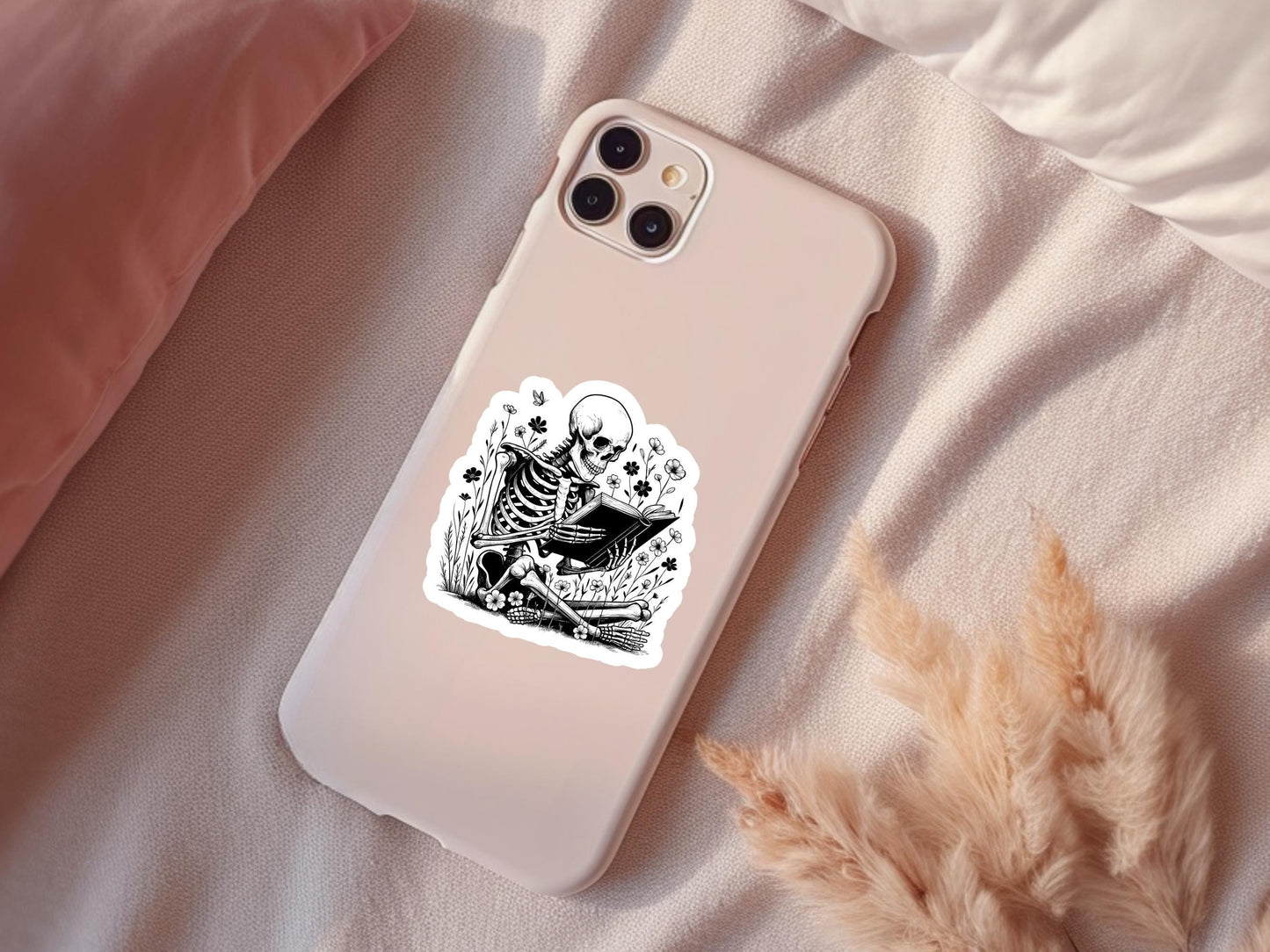 Skeleton Sitting In Flowers Reading a Book Sticker