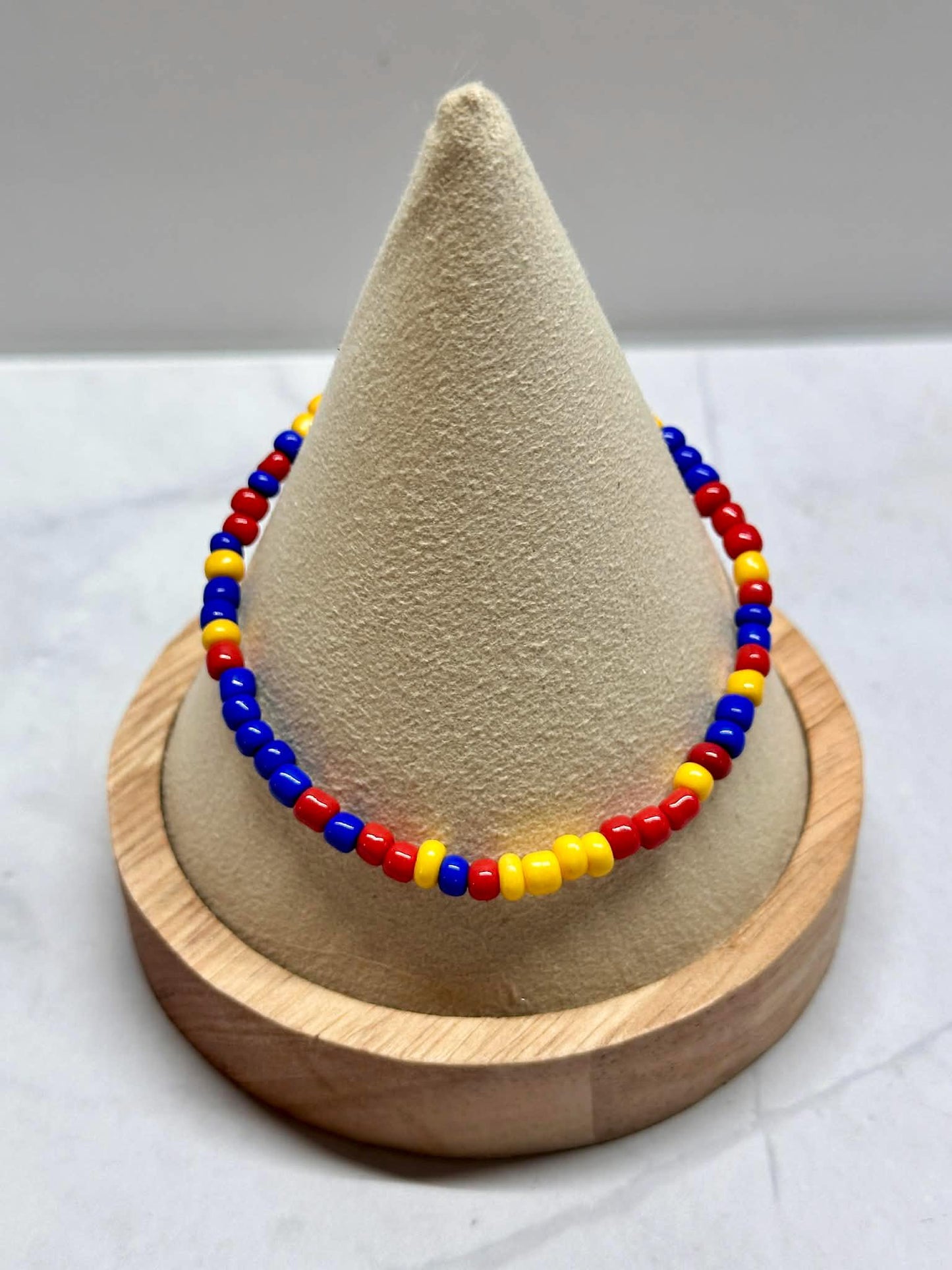 Single Strand Red, Blue, and Yellow Seed Bead Bracelet