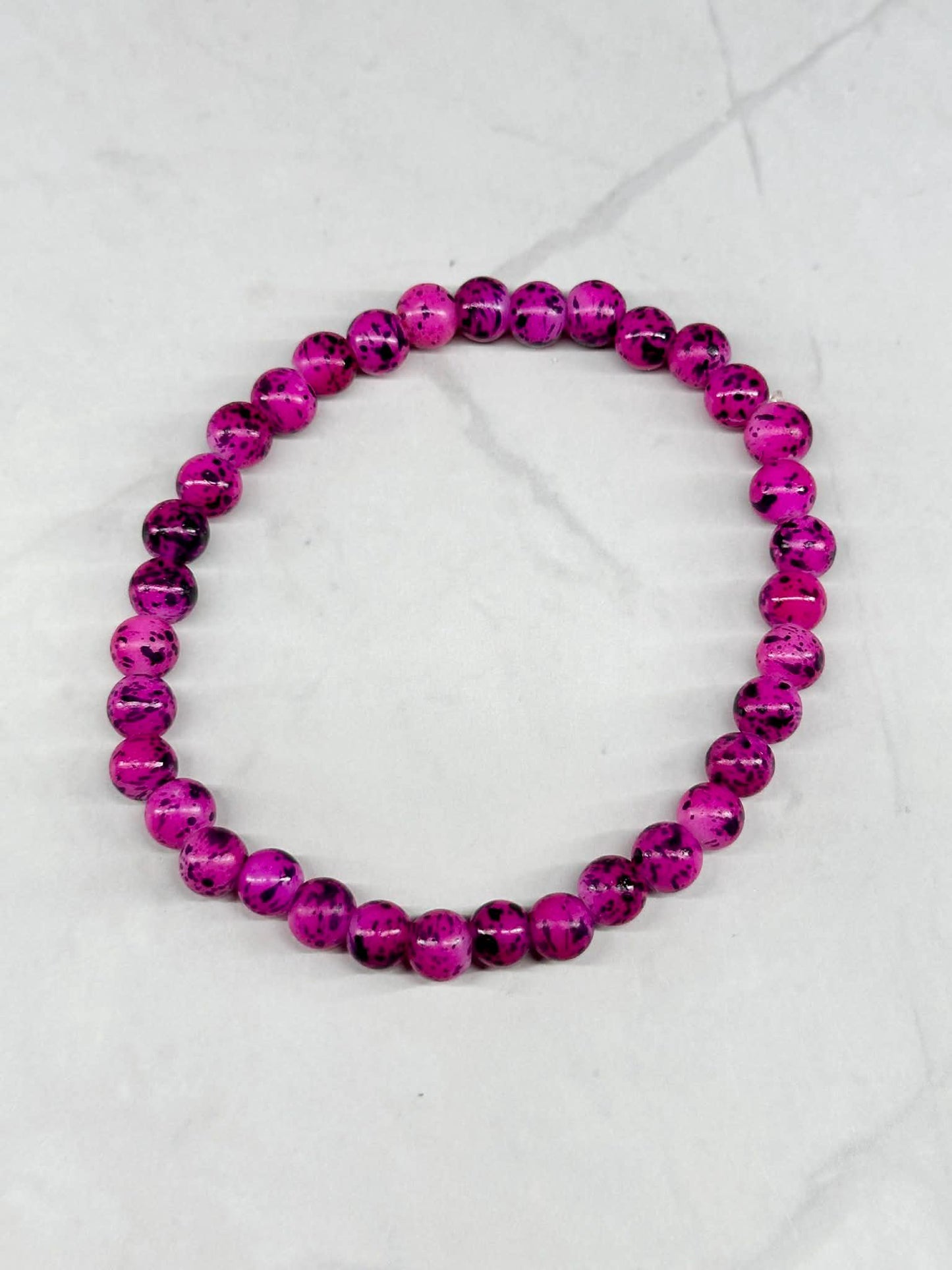 Single Strand Magenta Marbled Beaded Stretch Bracelet