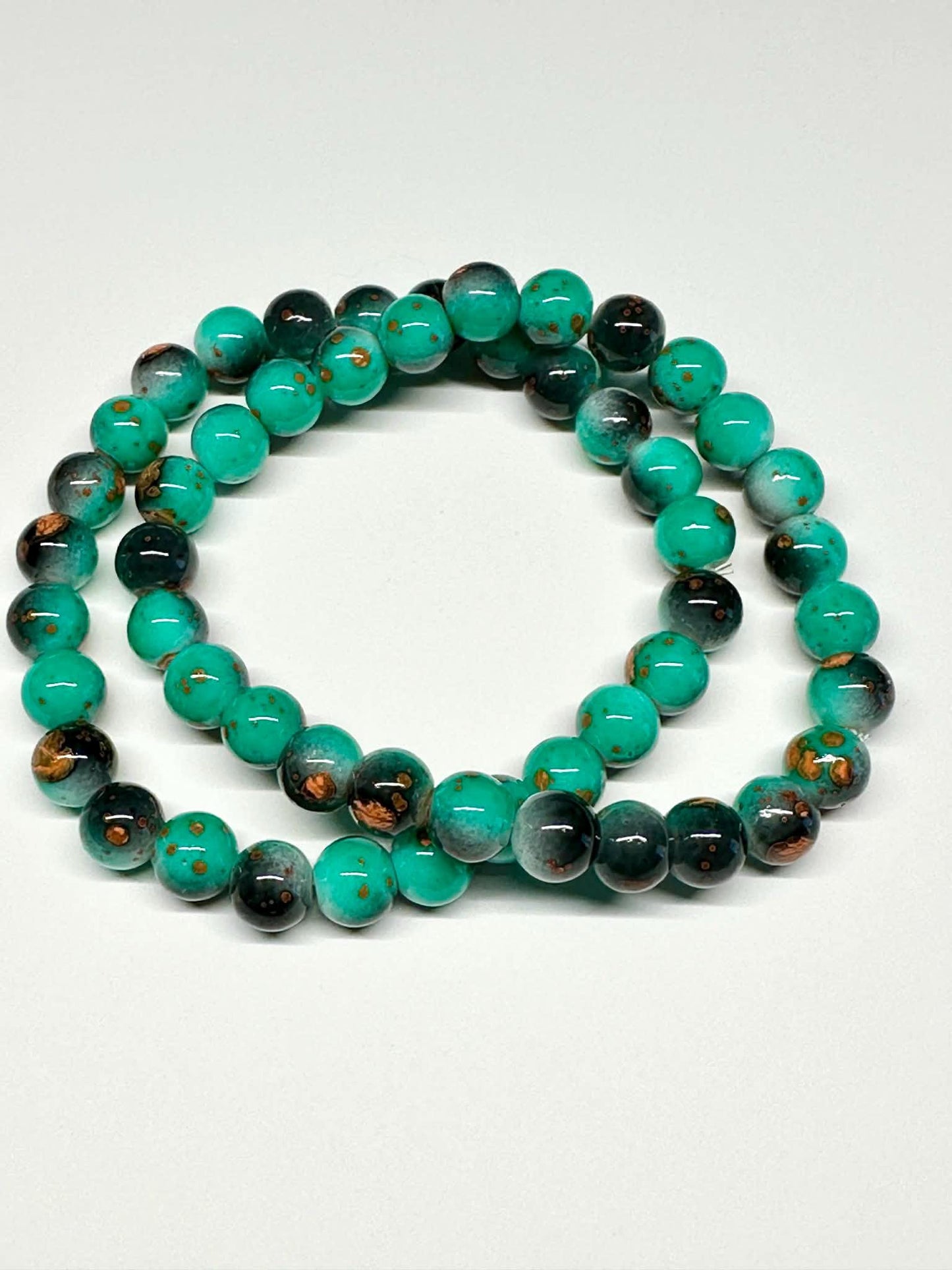 Single Strand Turquoise w/Black and Orange Beaded Stretch Bracelet