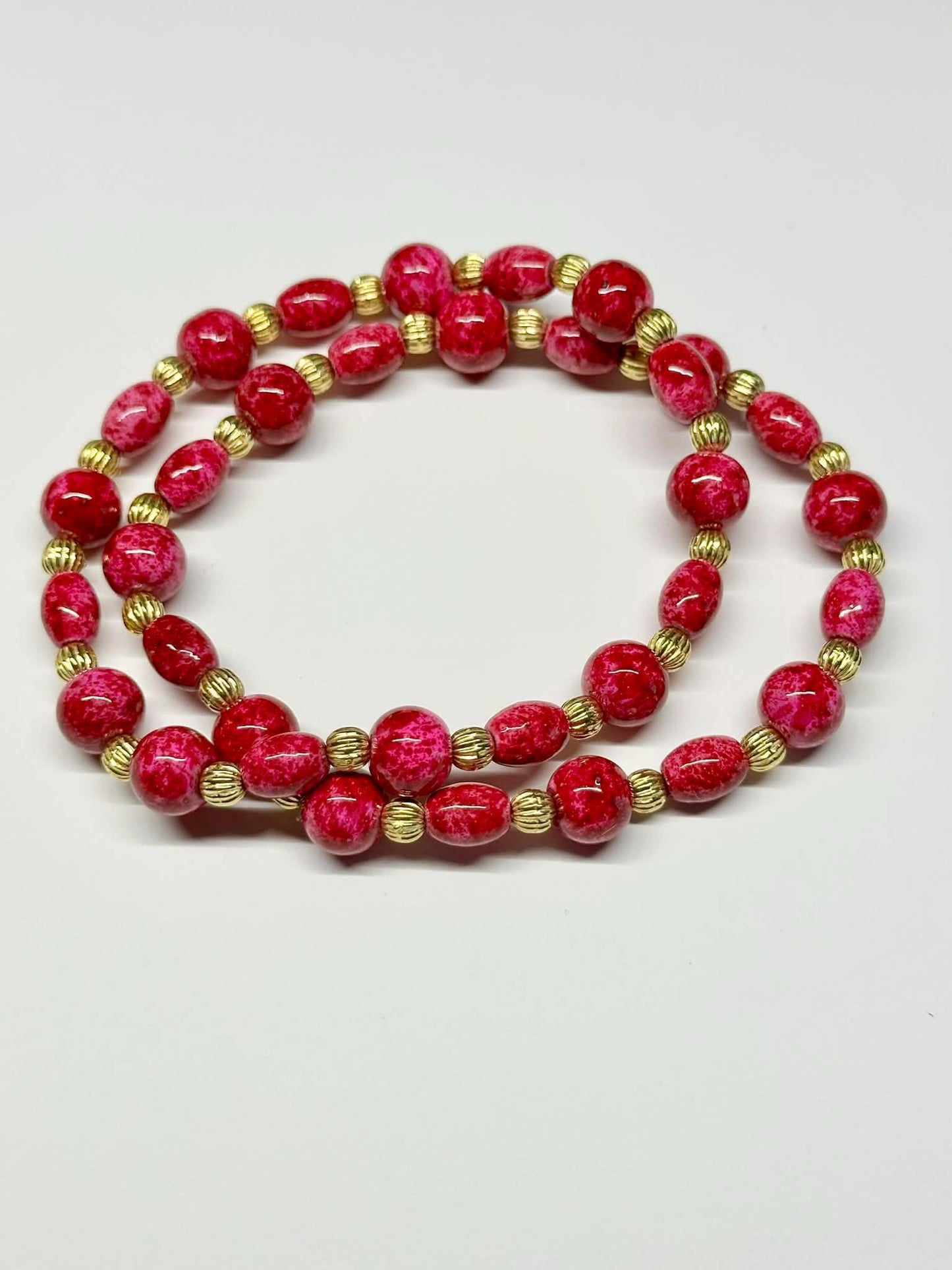 Single Strand Reddish Pink Mixture Beaded Stretch Bracelet