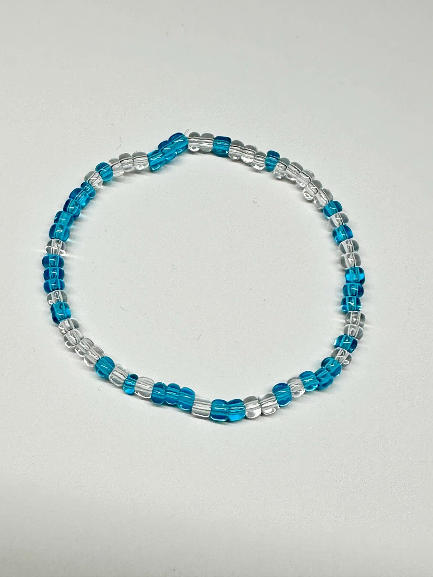 Single Strand Blue & Clear Transparent Seed Bead Bracelet