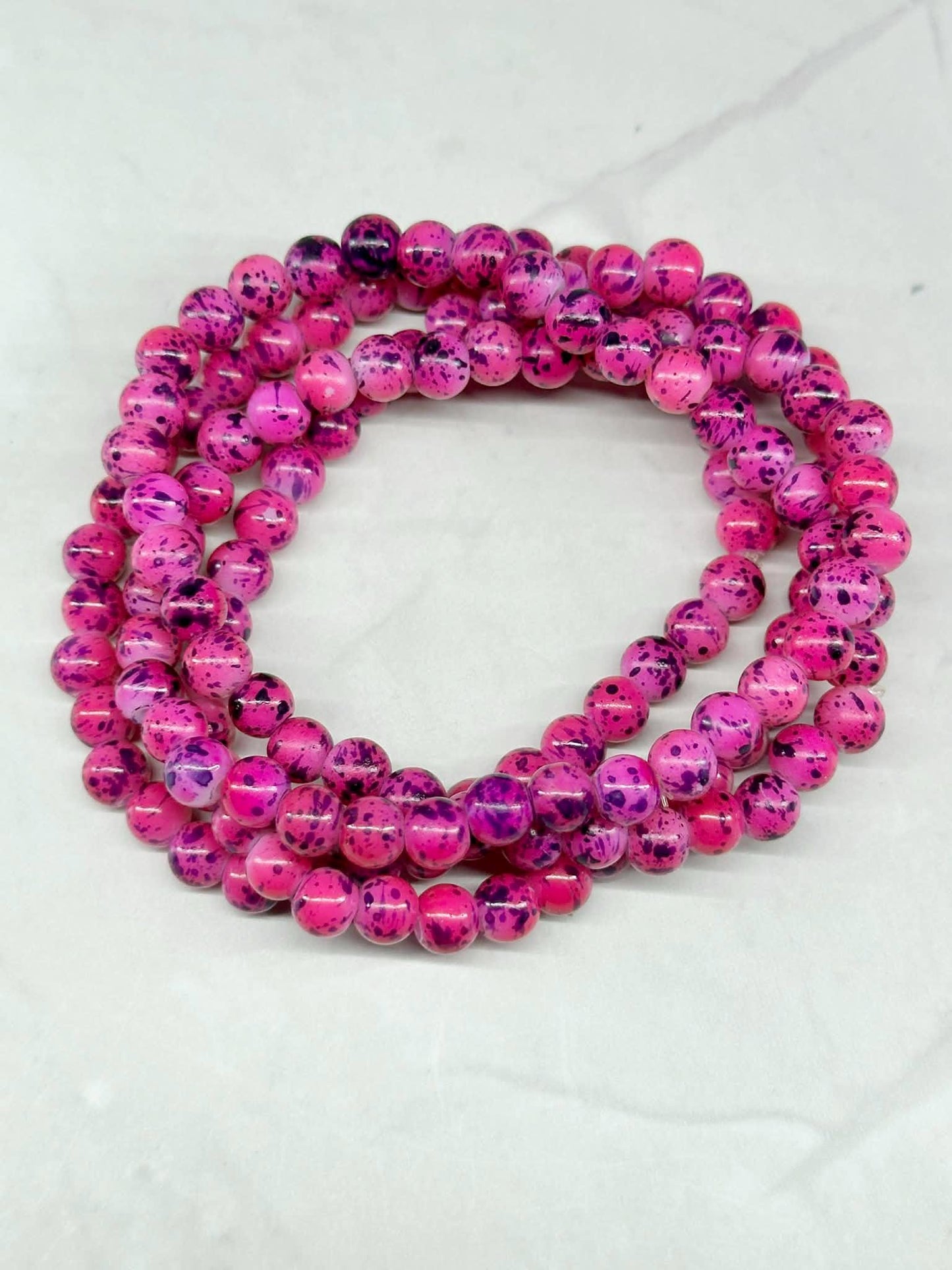 Single Strand Magenta Marbled Beaded Stretch Bracelet