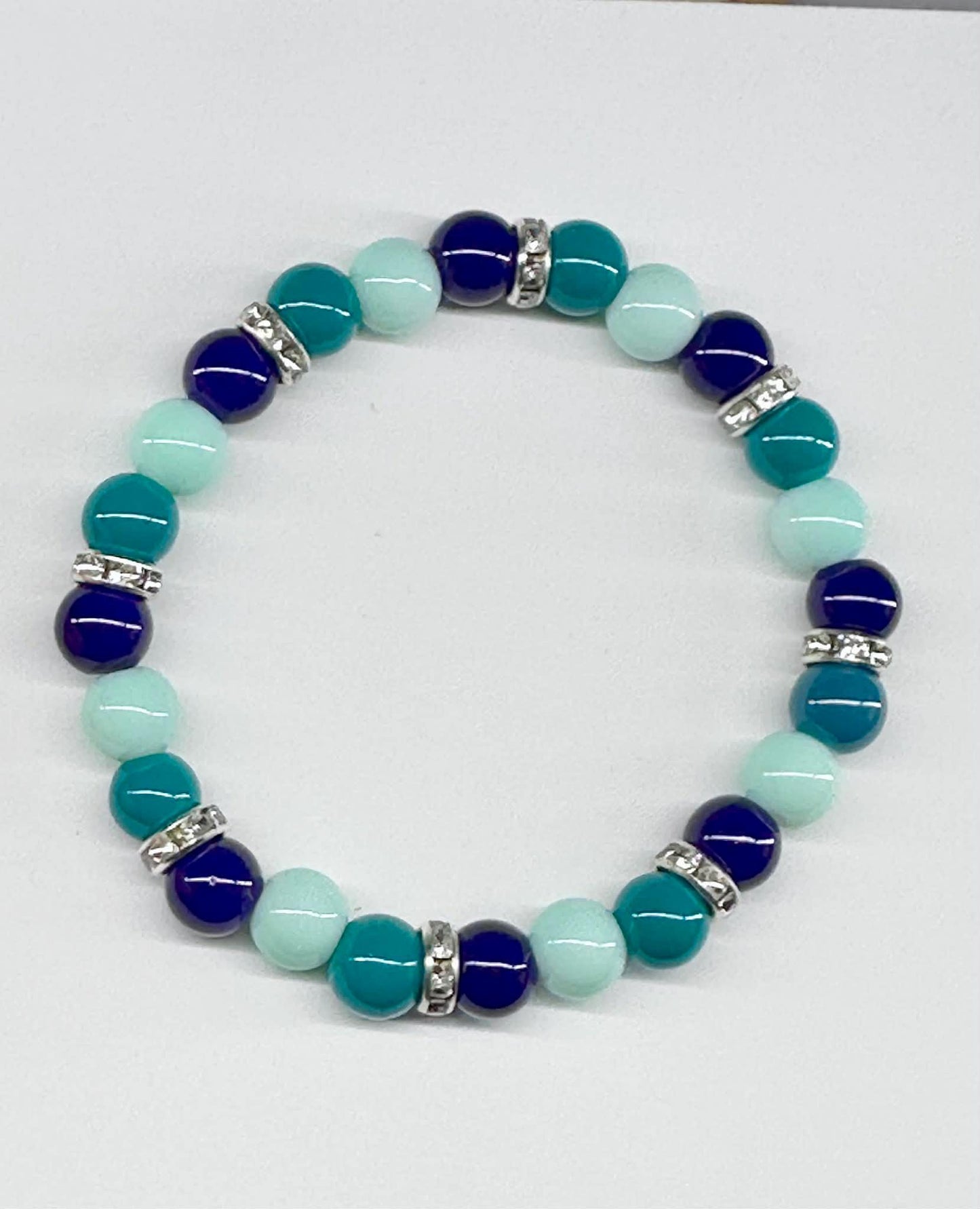 Single Strand Blueish/Green Mixture Beaded Stretch Bracelet