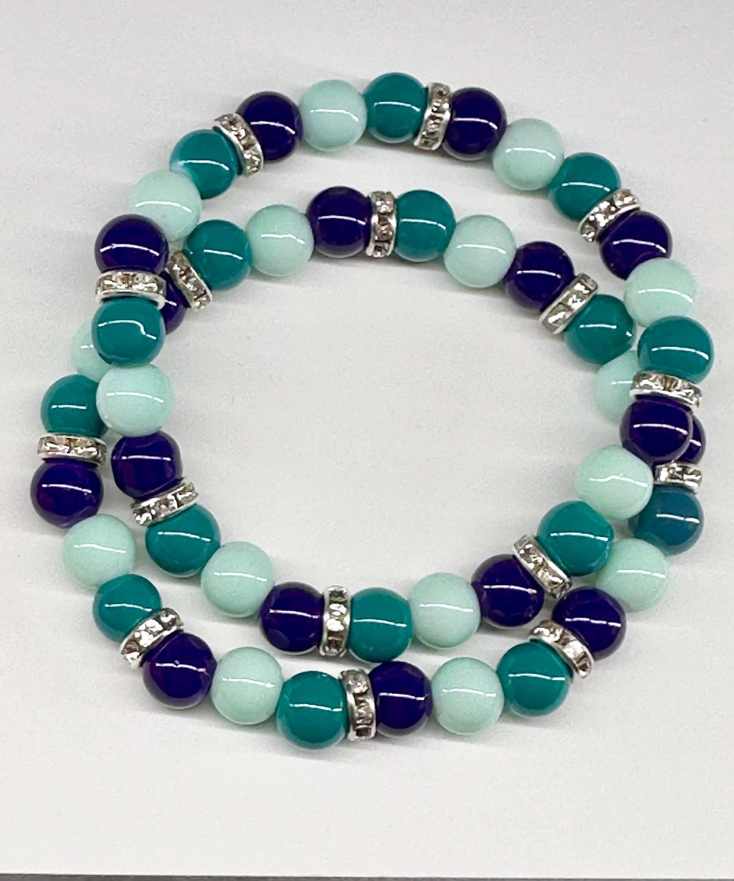 Single Strand Blueish/Green Mixture Beaded Stretch Bracelet
